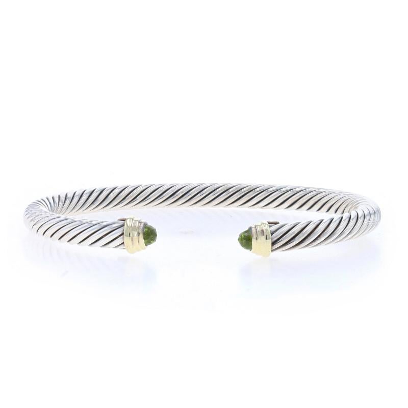 Retail Price: $650

Brand: David Yurman
Collection: Classic Cable
Design:  5mm

Metal Content: Sterling Silver & 14k Yellow Gold

Stone Information

Natural Peridot
Color: Green

Style: Cuff
Fastening Type: N/A (slides over