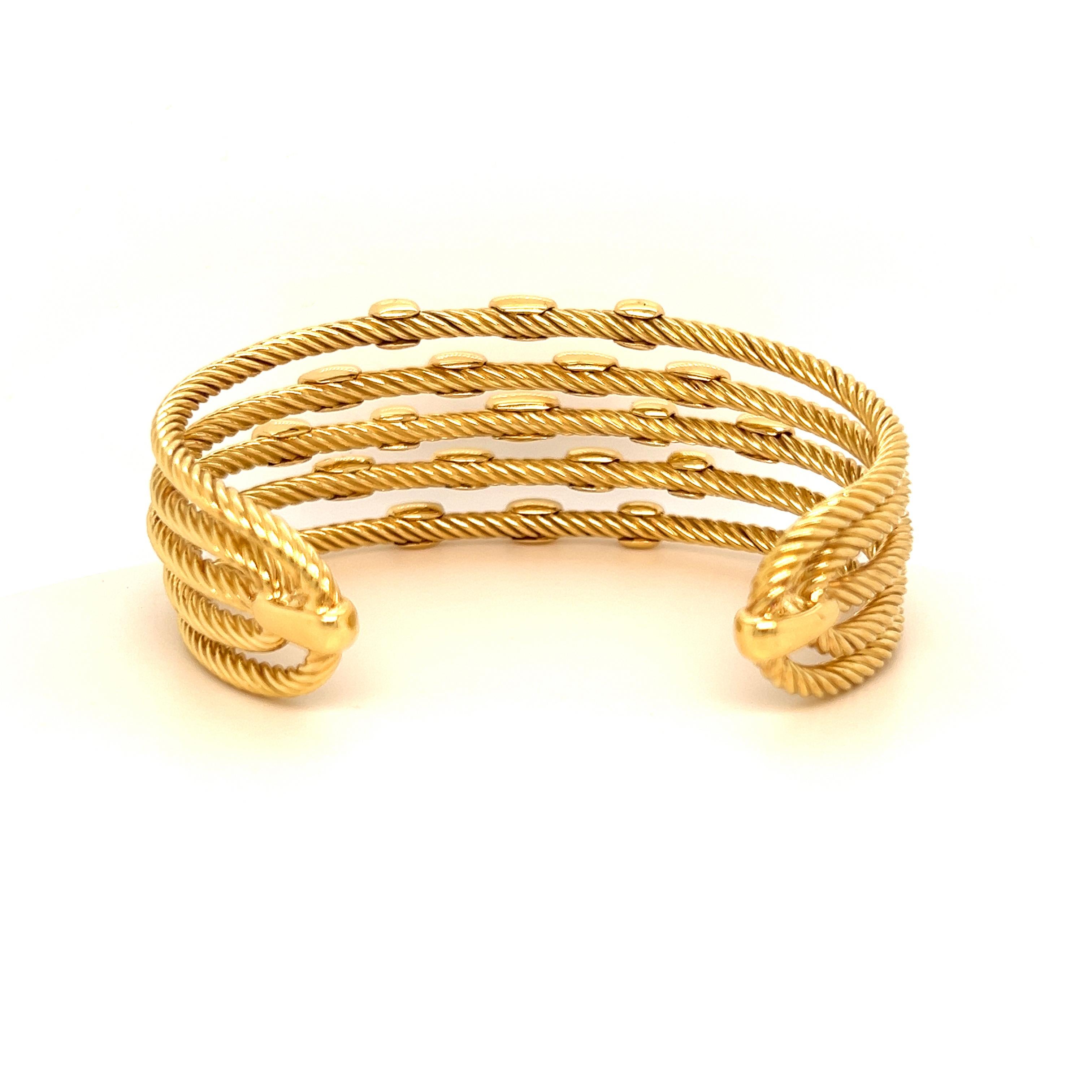 David Yurman Confetti 18K Yellow Gold and Diamond Five Row Cuff Bracelet

Gorgeous bracelet by David Yurman, this cuff is the five-row version in 18k gold.

Apprx. 1 carat diamonds total weight

Bracelet is from the 