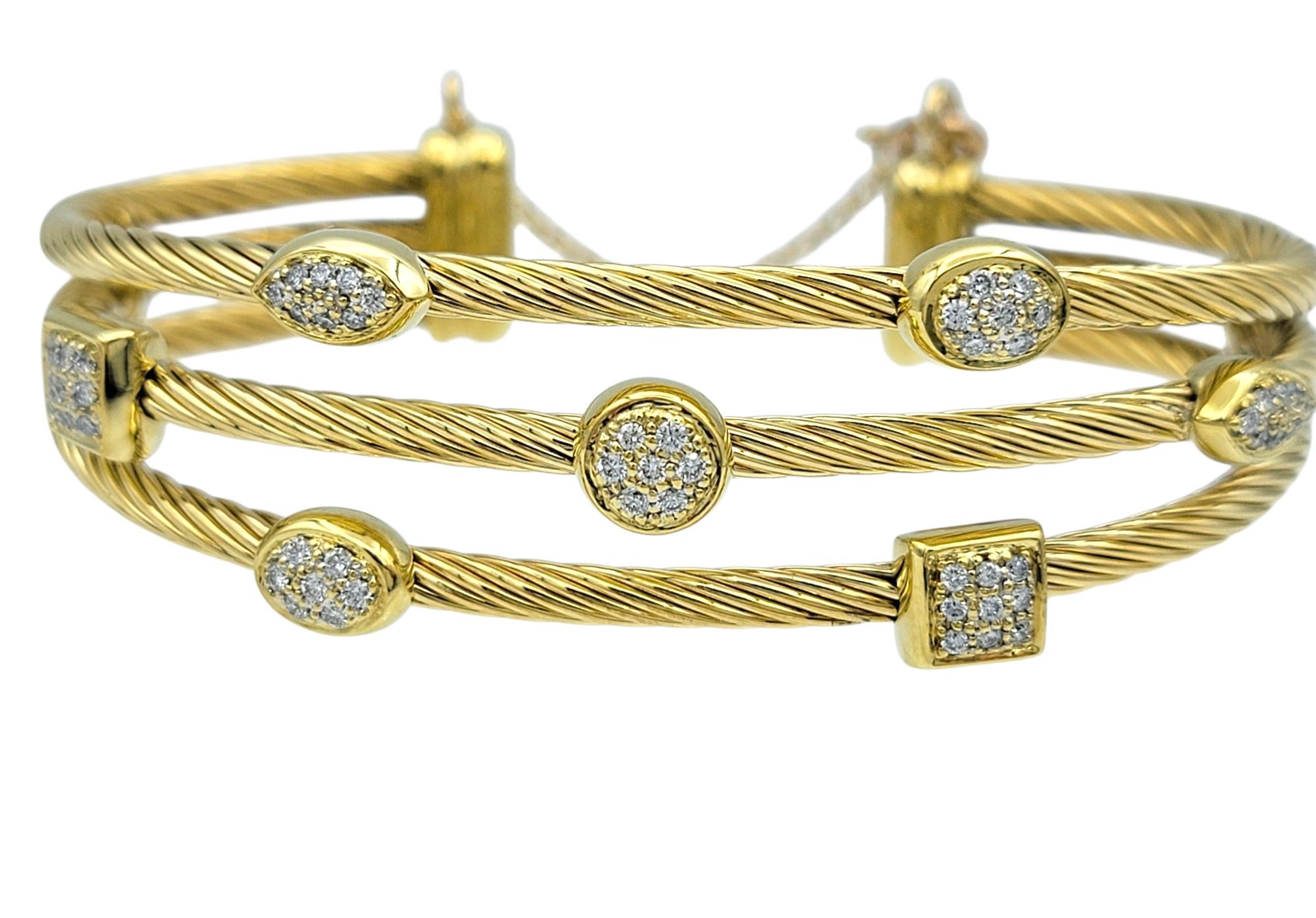 From David Yurman's Confetti Collection, this stunning bracelet showcases his signature cable design in rich 18 karat yellow gold. Three rows of twisted gold are accented with sparkling diamond pavé stations, offering dynamic texture and refined
