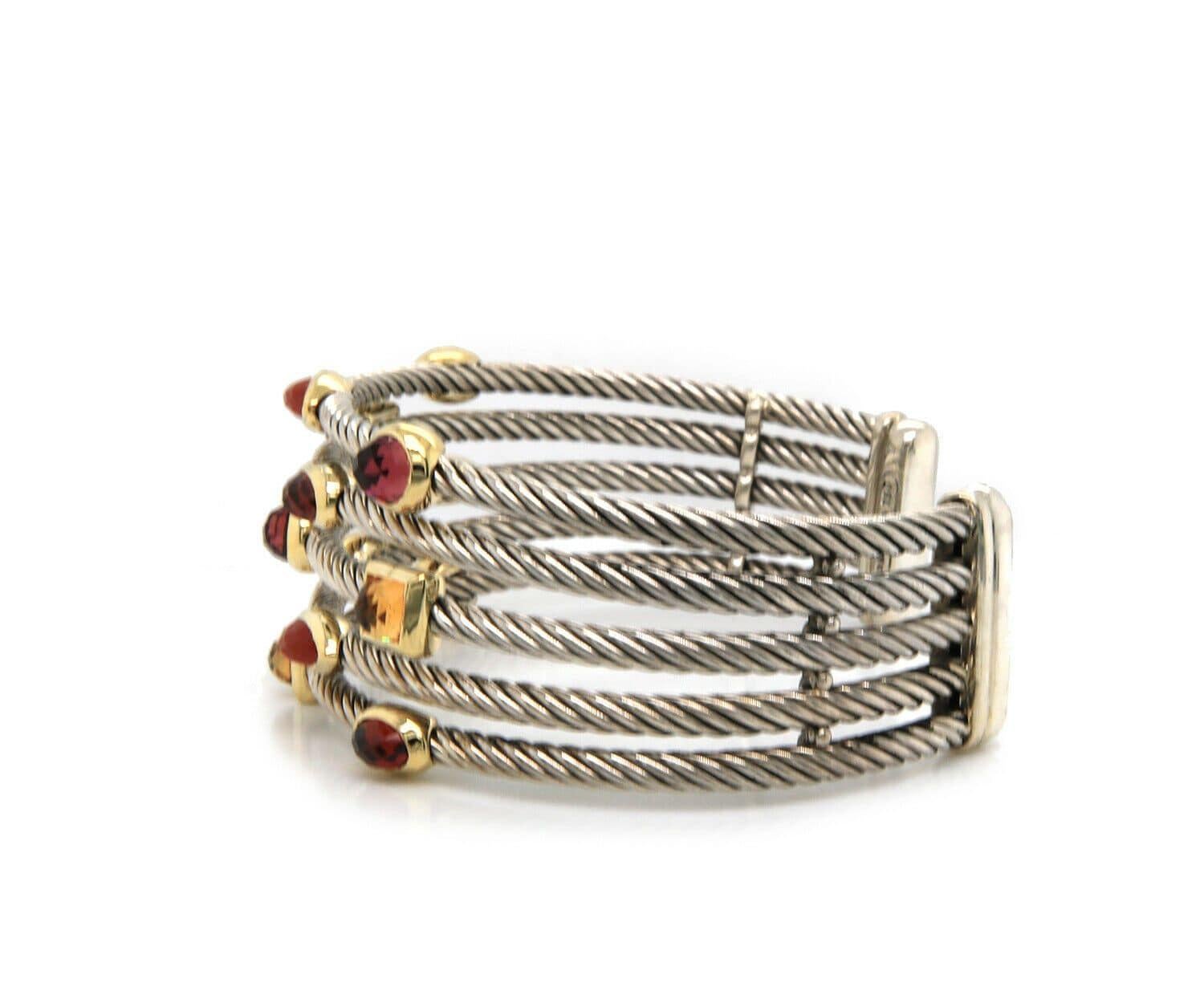 David Yurman Confetti Five Row Cuff Bracelet in 18K and Sterling

David Yurman Confetti Five Row Cuff Bracelet
18K Yellow Gold
Sterling Silver
Bracelet Width: Approx. 24.0 MM
Bracelet Size: Approx. 6.75 Inches
Weight: Approx. 54.90 Grams
Stamped: