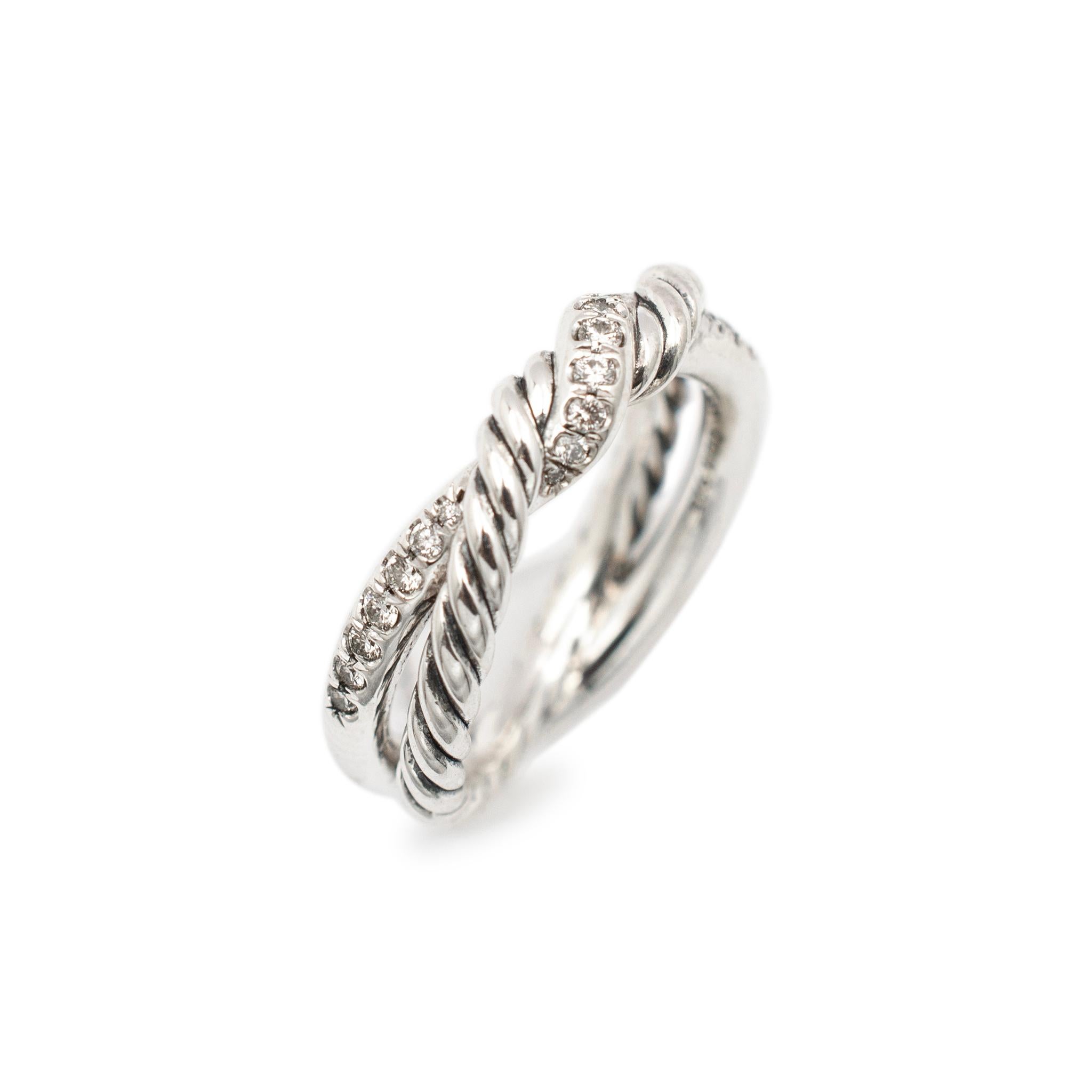 Gender: Ladies

Metal Type: 925 Sterling Silver

Size: 6.5

Shank Maximum Width: 5.80 mm

Weight: 5.20 grams

Ladies silver diamond bypass ring with a split-shank Engraved with 