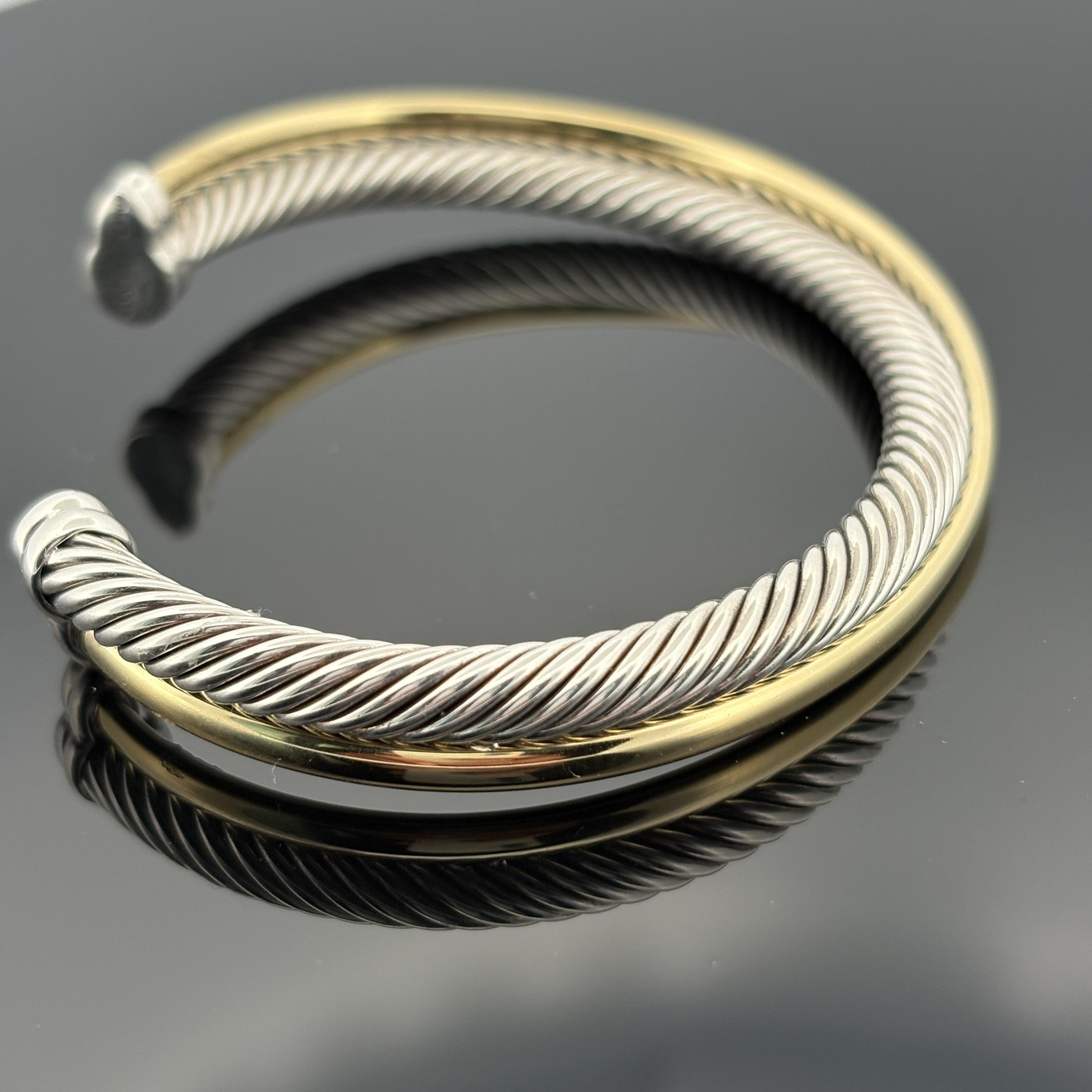 David Yurman Bracciale a due file incrociate - Argento e oro 18 carati, grande, 5mm

Un design intramontabile di David Yurman, il bracciale Crossover Two Row combina con eleganza la brillantezza dell'argento sterling con il calore dell'oro giallo
