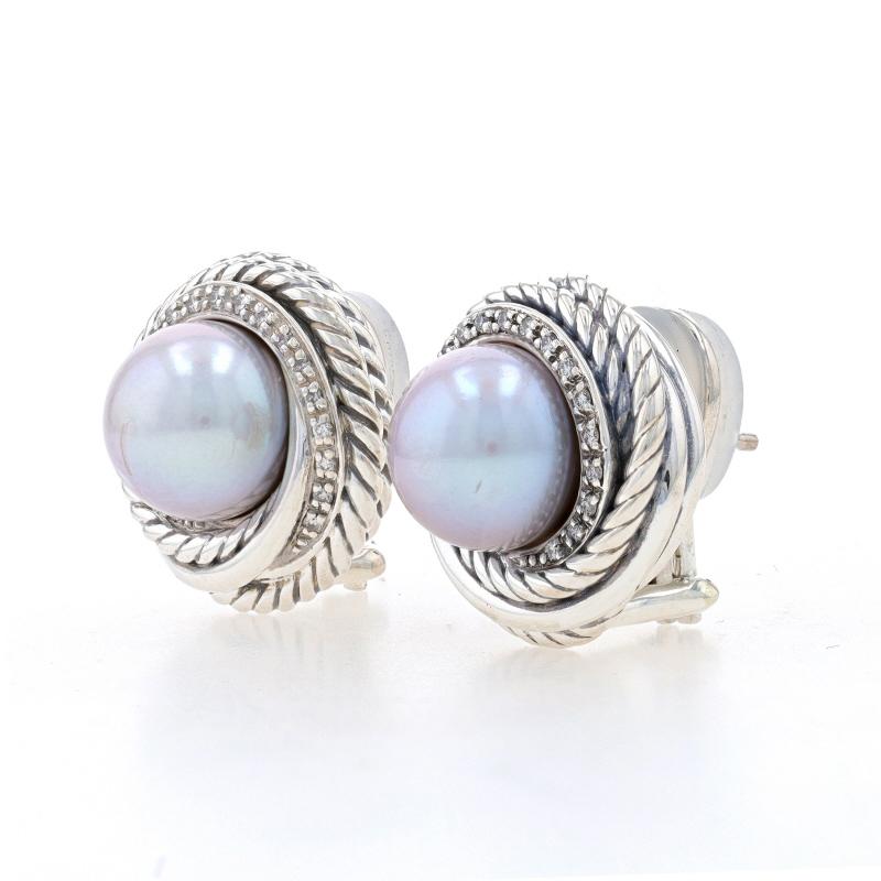 Retail Price: $1500

Brand: David Yurman
Collection: Crossover
Design: Cable

Metal Content: Sterling Silver (earrings) & 14k White Gold (posts)

Stone Information
Cultured Pearls
Color: Light Grey
Diameter: 9.7mm & 9.8mm

Natural Diamonds
Carat(s):