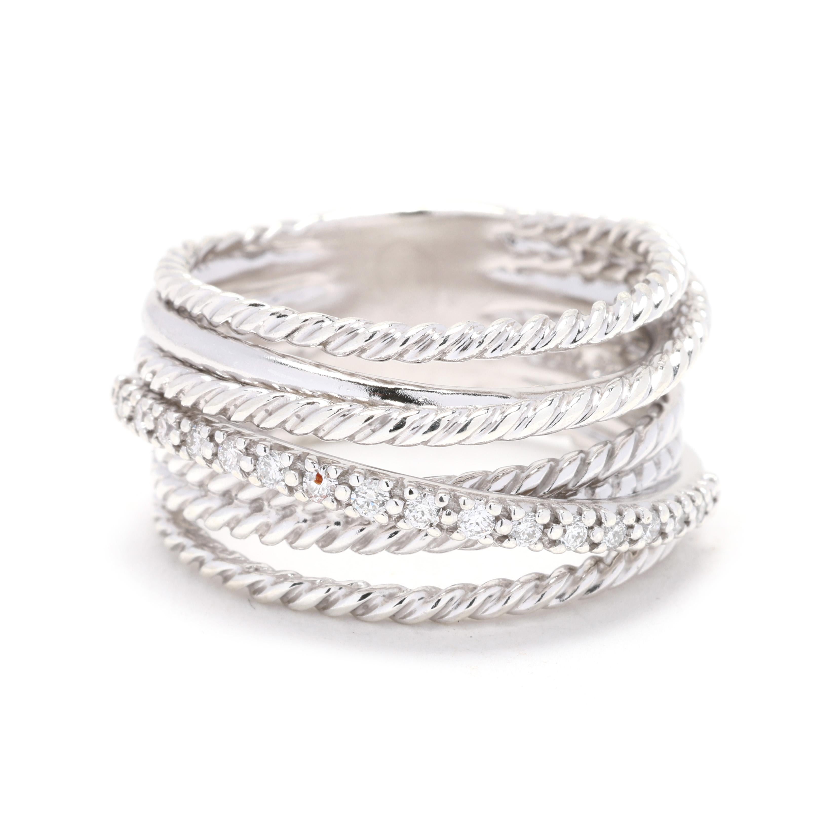 Embrace the iconic style of David Yurman with the Crossover Collection Ring in sterling silver. Designed for ring size 7, this stunning statement ring showcases the signature crossover design, blending modern sophistication with timeless
