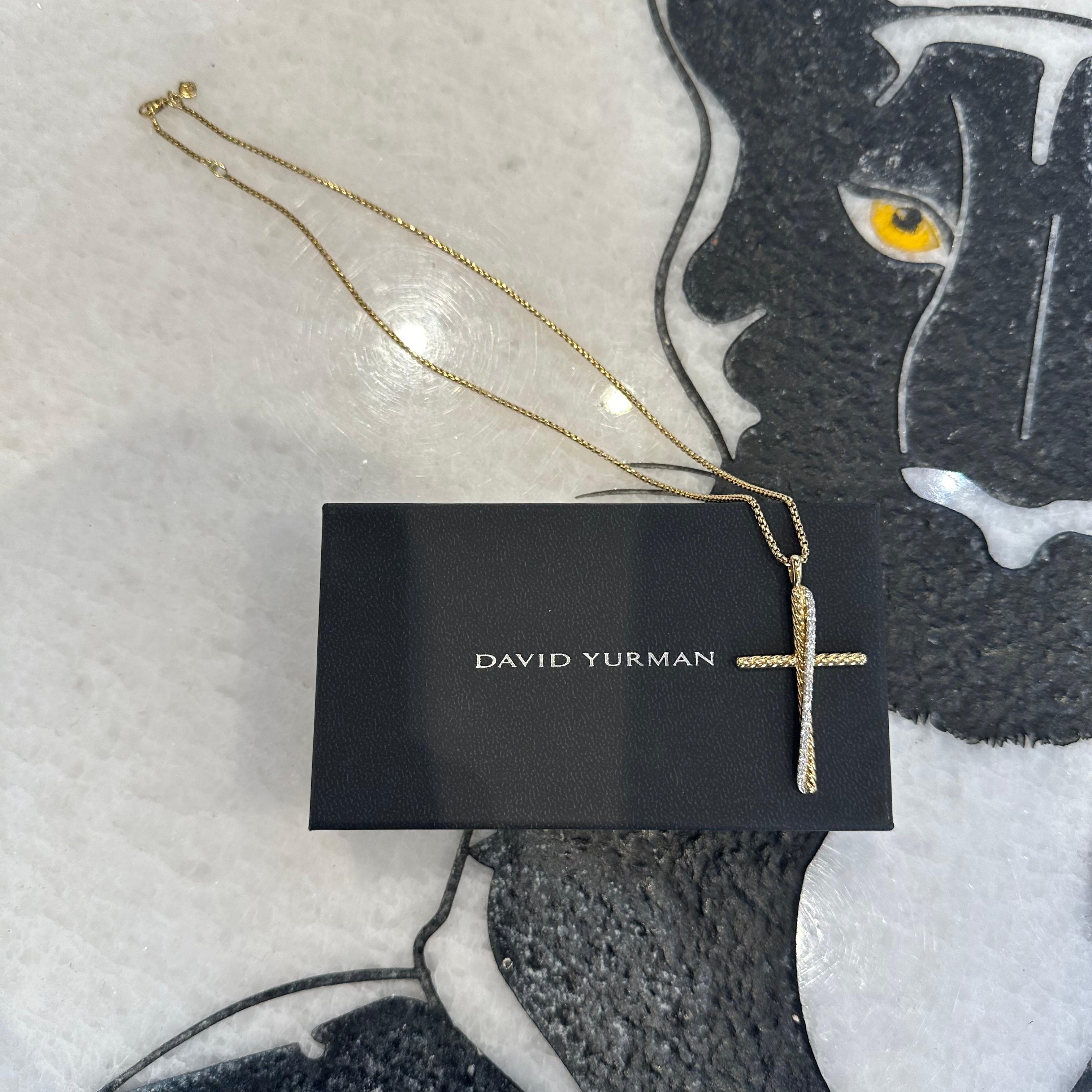 Designer: David Yurman

Collection: Cable Classics

Model: Crossover Cross

Style:  Pendant necklace

Chain: Box link

Pendant size: 35.6mm x 19.5mm

Metal: 18k Yellow Gold

Metal Purity: 18k

Stones: Round Brilliant Cut Diamonds

Total Carat