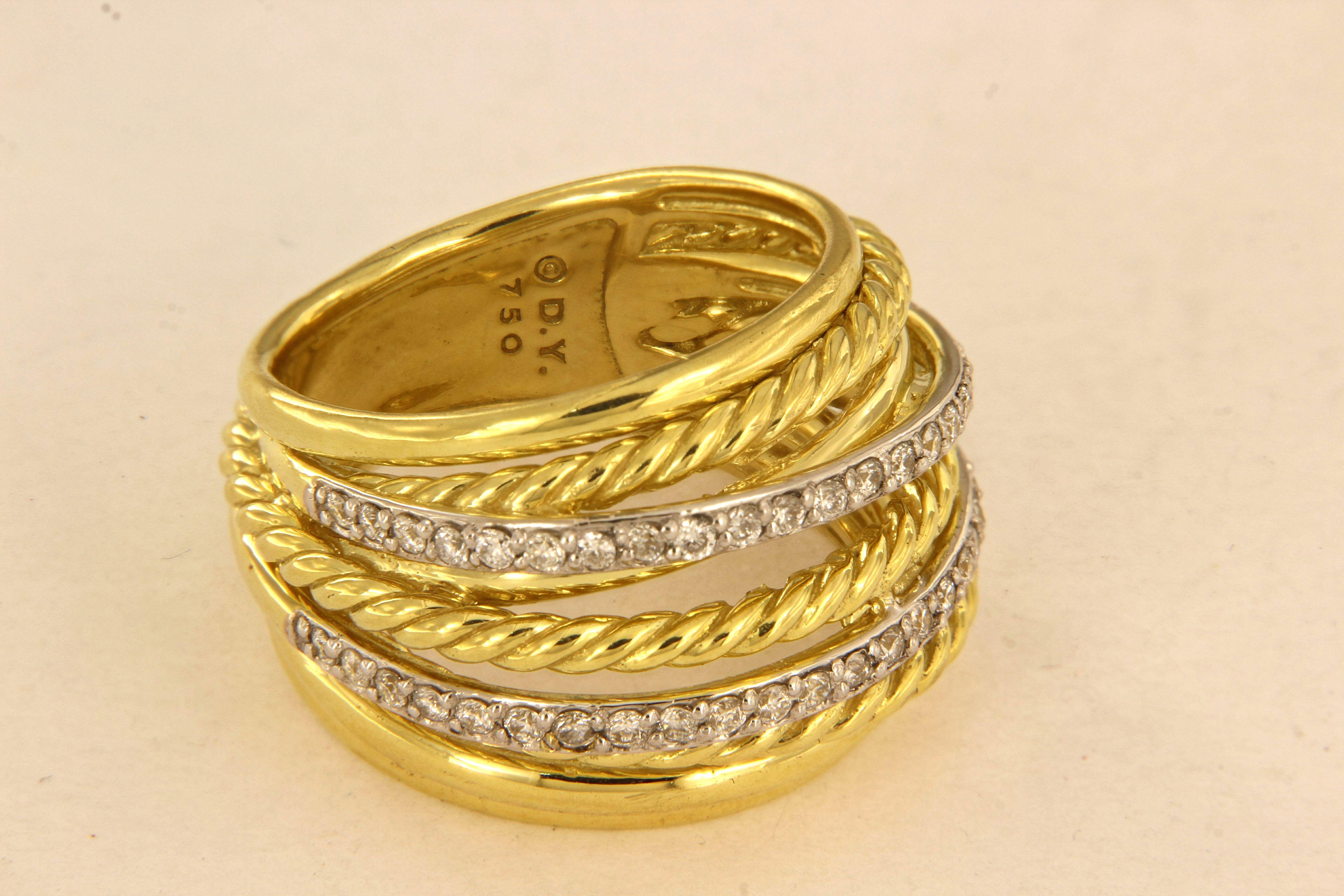 THE CROSSOVER COLLECTION

-18k Yellow Gold
-Ring size: 7.5
-Ring width: 0.3-0.7”
-Diamond: 0.67 ct.

Like-new, mint condition ring.
David Yurman box included.

Retail: $5,200