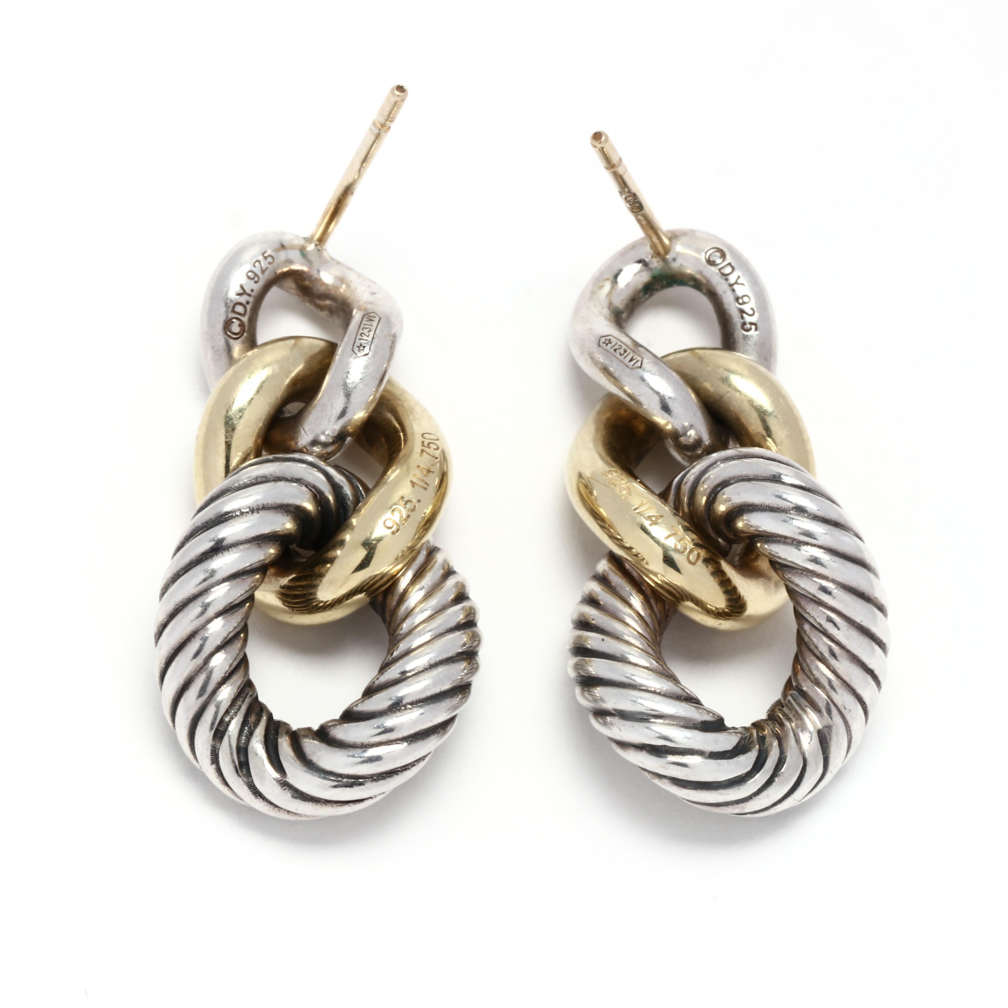 A pair of David Yurman 14 karat yellow gold and sterling silver curb link dangle earrings. From the Belmont collection, a pair of tapered curb link earrings with a polished silver link, a polished gold link and a cable motif silver link with post