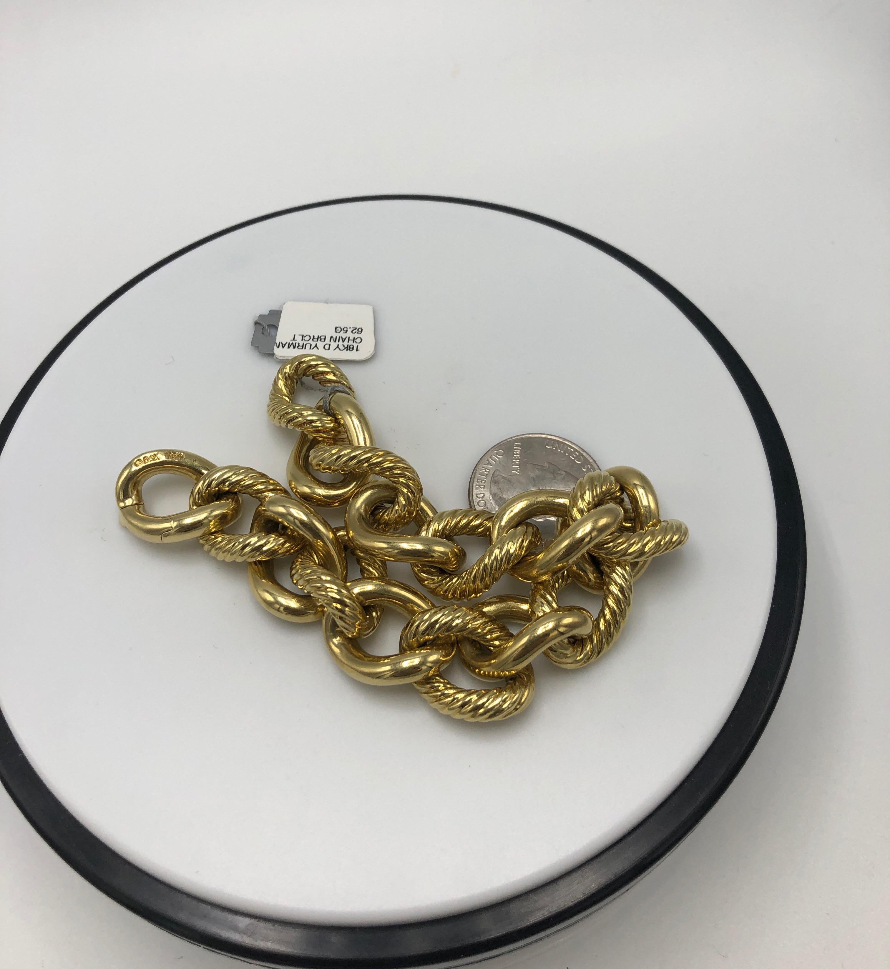 David Yurman 18k Yellow Gold Curb Link Bracelet.  Fits Size 8 Wrist. Measures approximately 8 inches. Hidden Clasp. The dual texture links give this item the ability to go from casual to an evening out, without missing a beat. A substantial look,