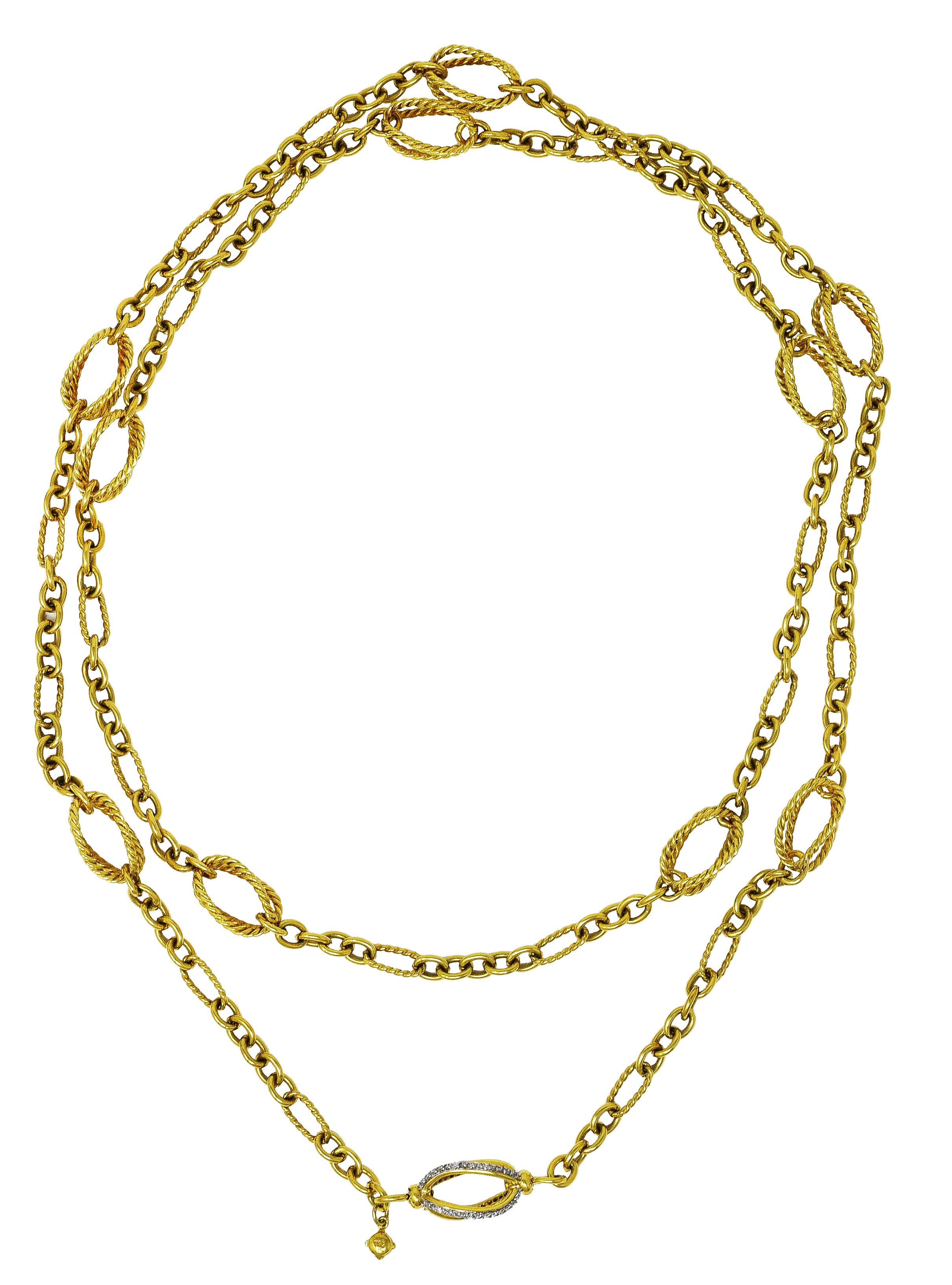 Eternity chain necklace is comprised of smooth and twisted cable links. With substantial openwork twisted cable stations. One station is highlighted with bead set round brilliant cut diamonds. Weighing in total approximately 0.55 carat - G/H color