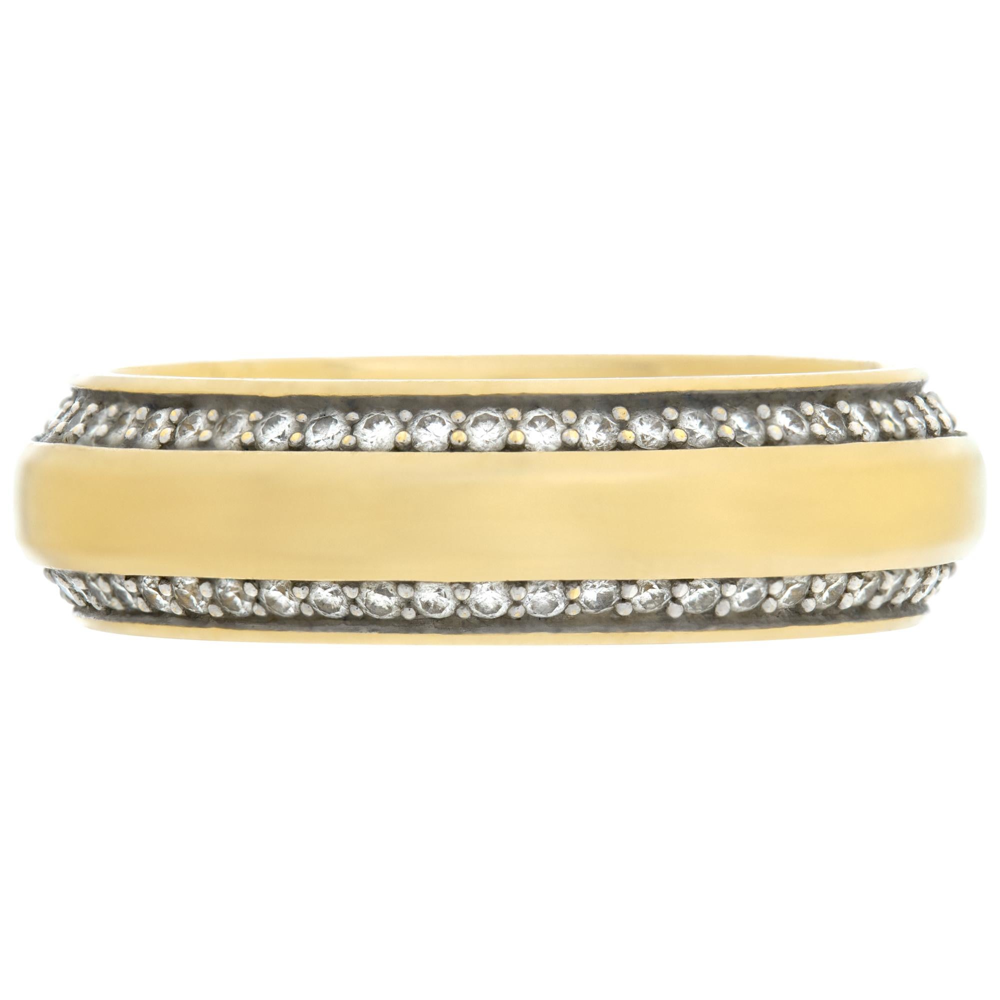 David Yurman diamonds wedding band in 18K yellow and white gold. Round brilliant diamonds total approx. weight:0.67 carat. 6mm width. Ring size 10. Comes with original box.

This David Yurman ring is currently size 10 and some items can be sized up