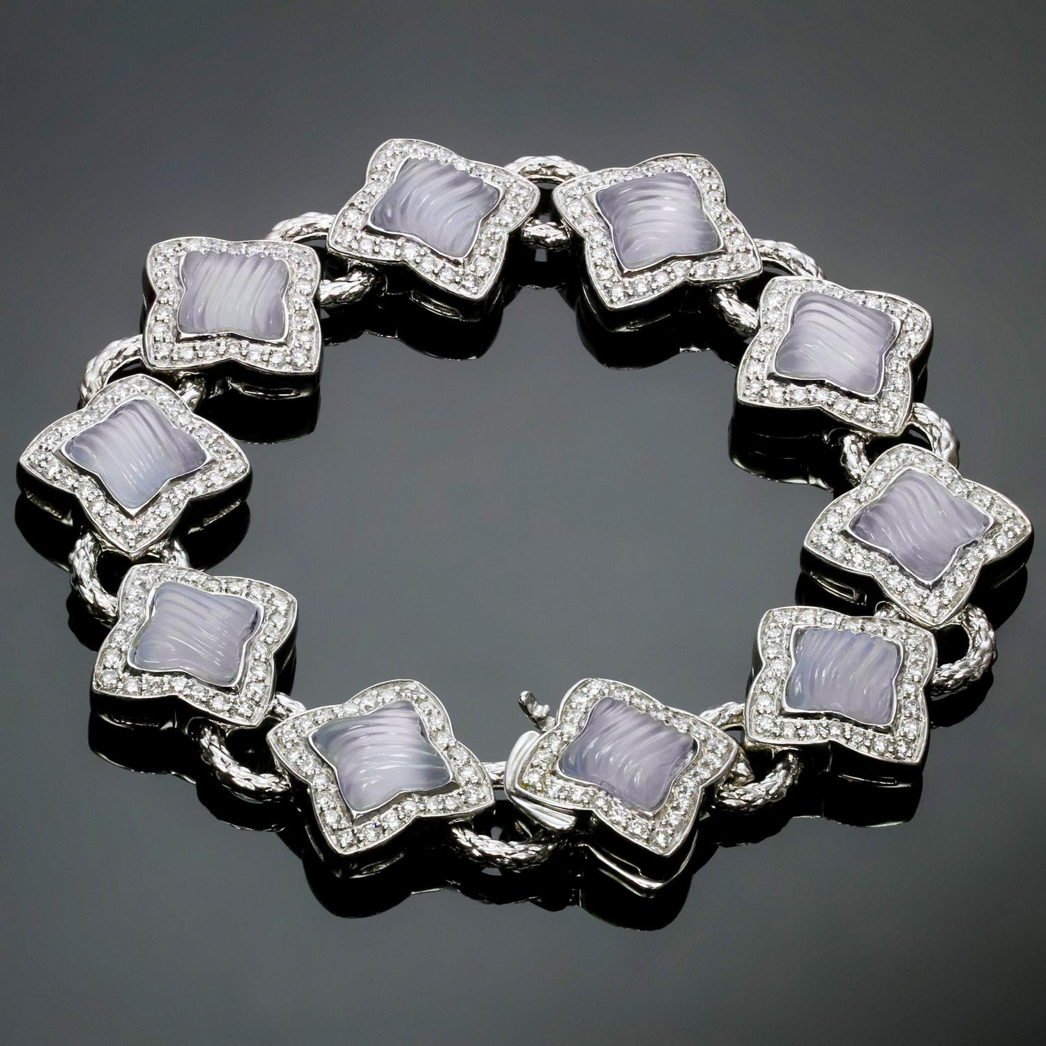 This chic David Yurman quatrefoil link bracelet is crafted in 18k white gold and set with blue chalcedony stones and sparkling diamonds of an estimated 4.0 carats. Made in United States circa 2000s. Measurements: 0.66