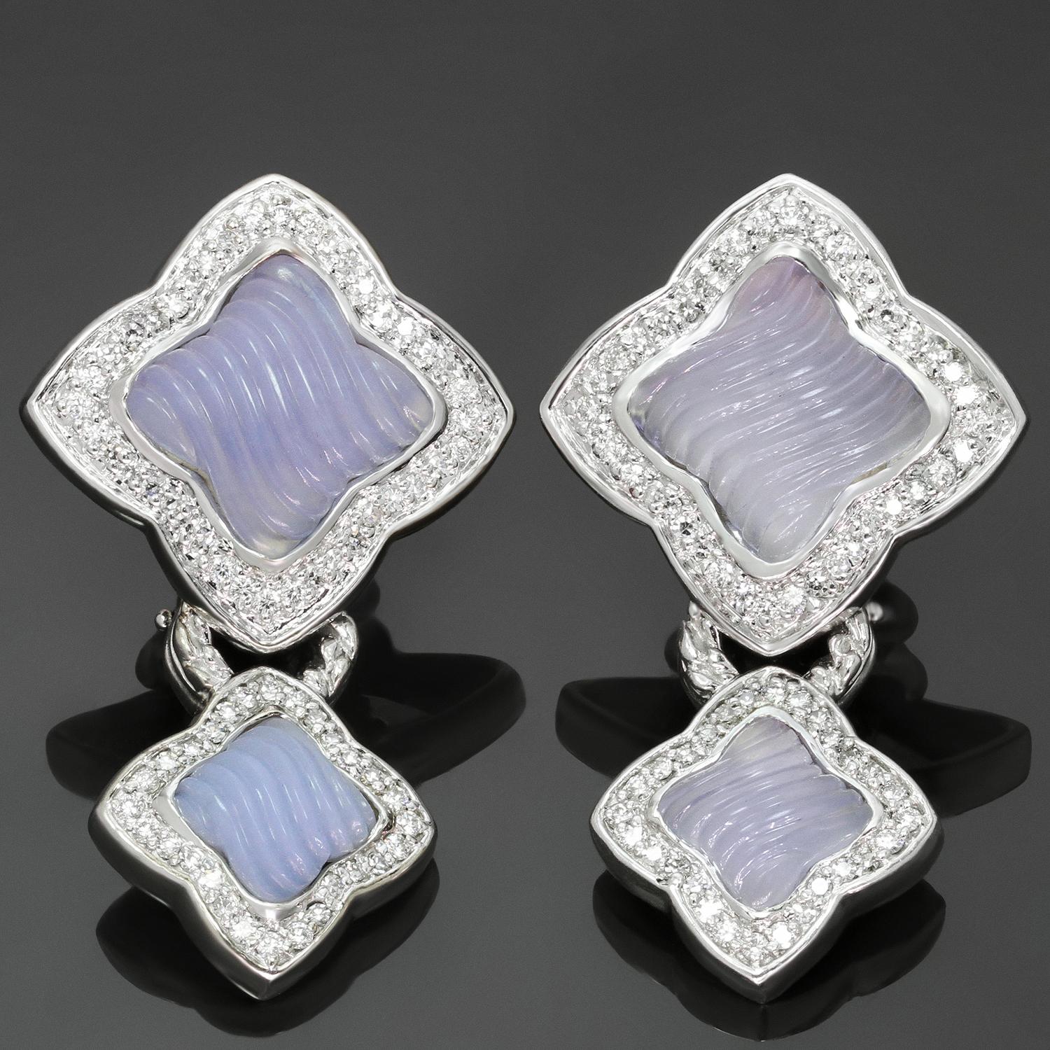 These gorgeous David Yurman earrings are crafted in 18k white gold and set carved chalcedony stones and round diamonds of an estimated 2.00 carats. The chalcedony stones in one earring are slightly faded. The drops on these versatile earrings are