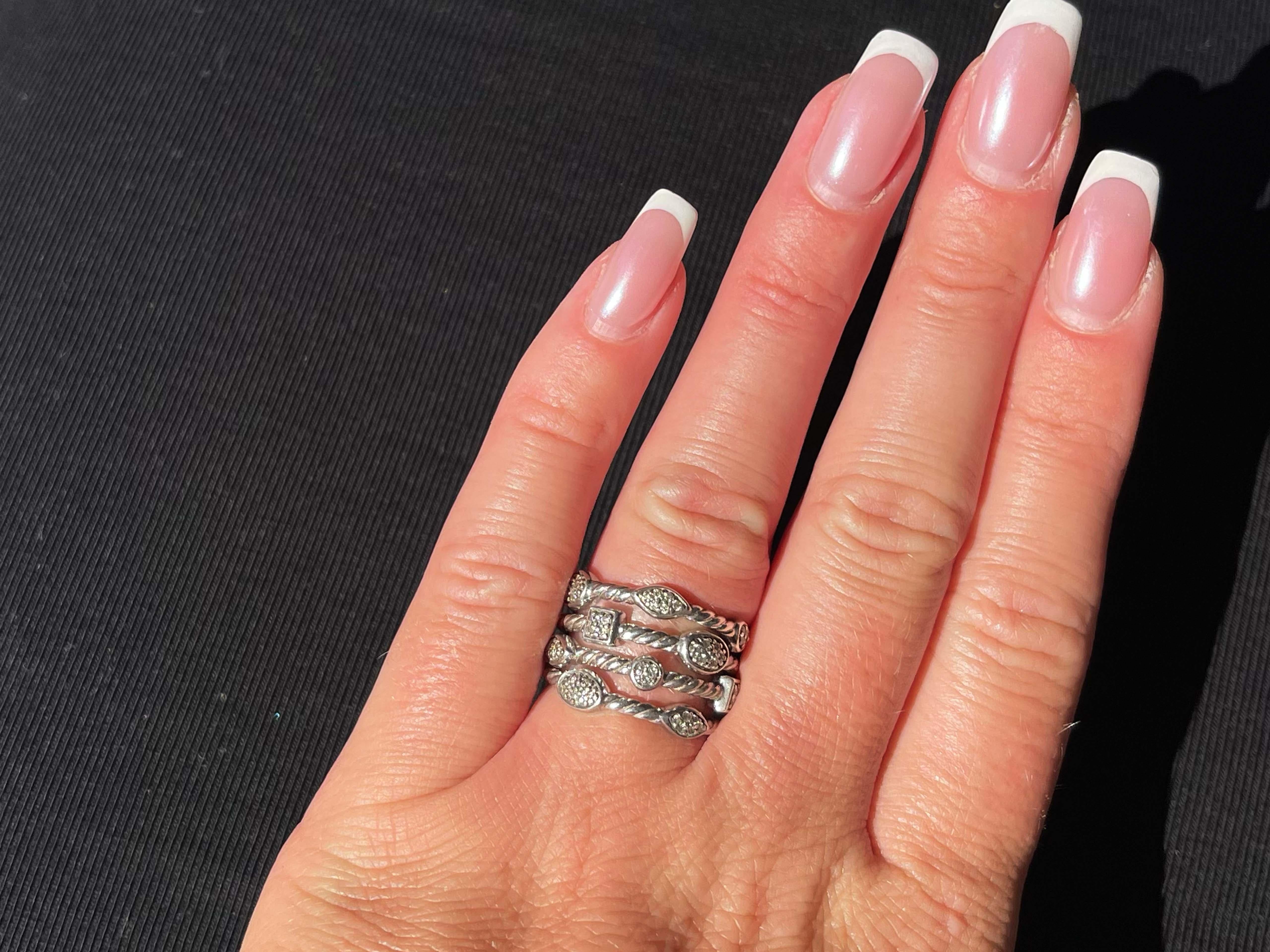 
Ring Specifications:
Designer: David Yurman

Style: Statement Ring

Metal: 925 Sterling Silver

Gemstone: Diamond
​
​Diamond Count: 52 brilliant cut
​
​Diamond Carat Weight: ~0.16

Ring Size: 6.25 (medium)
Total Ring Weight: 7.4 grams

Condition: