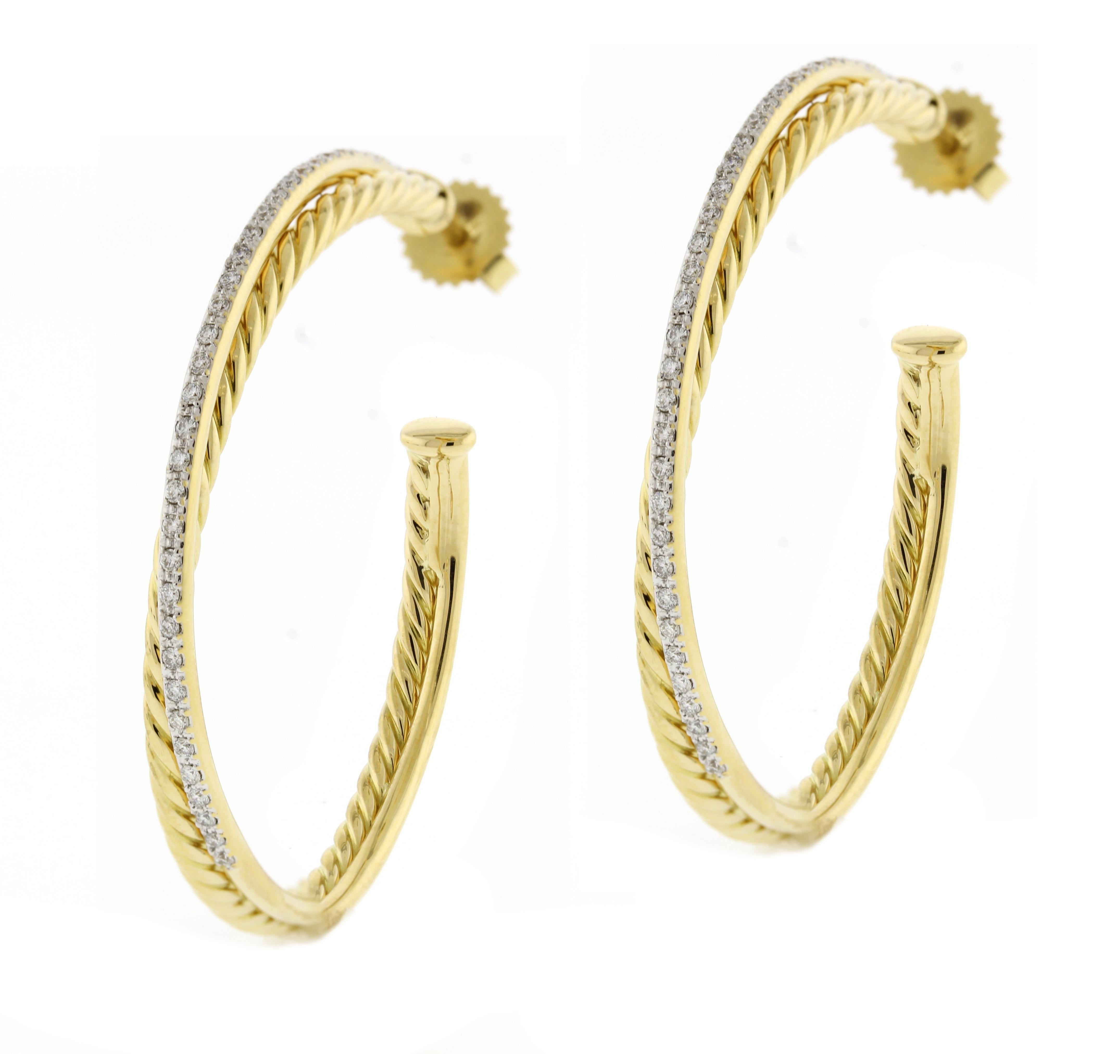 From David Yurman's crossover collection his large pair of  18 karat diamond hoop earring. The earring have an inside diameter of 38mm and .46 carats of diamond. The earrings are in as new condition. These earring currently retail for $4700