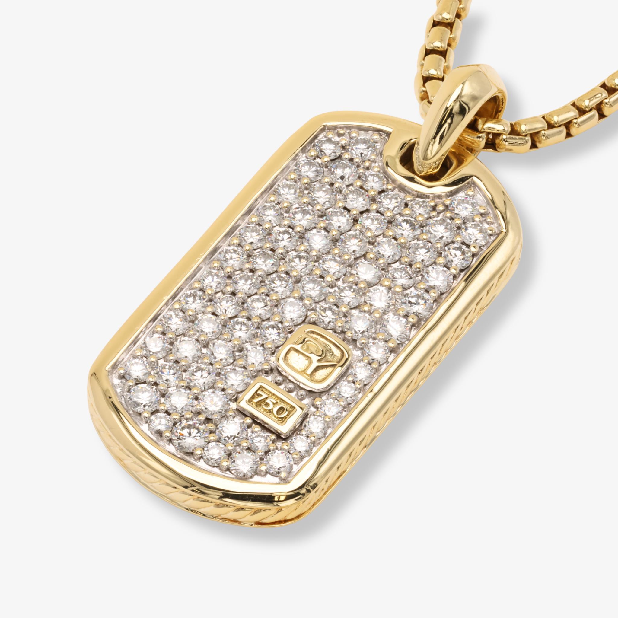 Striking David Yurman 18k yellow gold dog tag pendant accented with diamonds, paired with a 26 inch 2.7mm David Yurman box chain.

This David Yurman Diamond Dog Tag Pendant Necklace is a bold and refined design that blends contemporary styling with