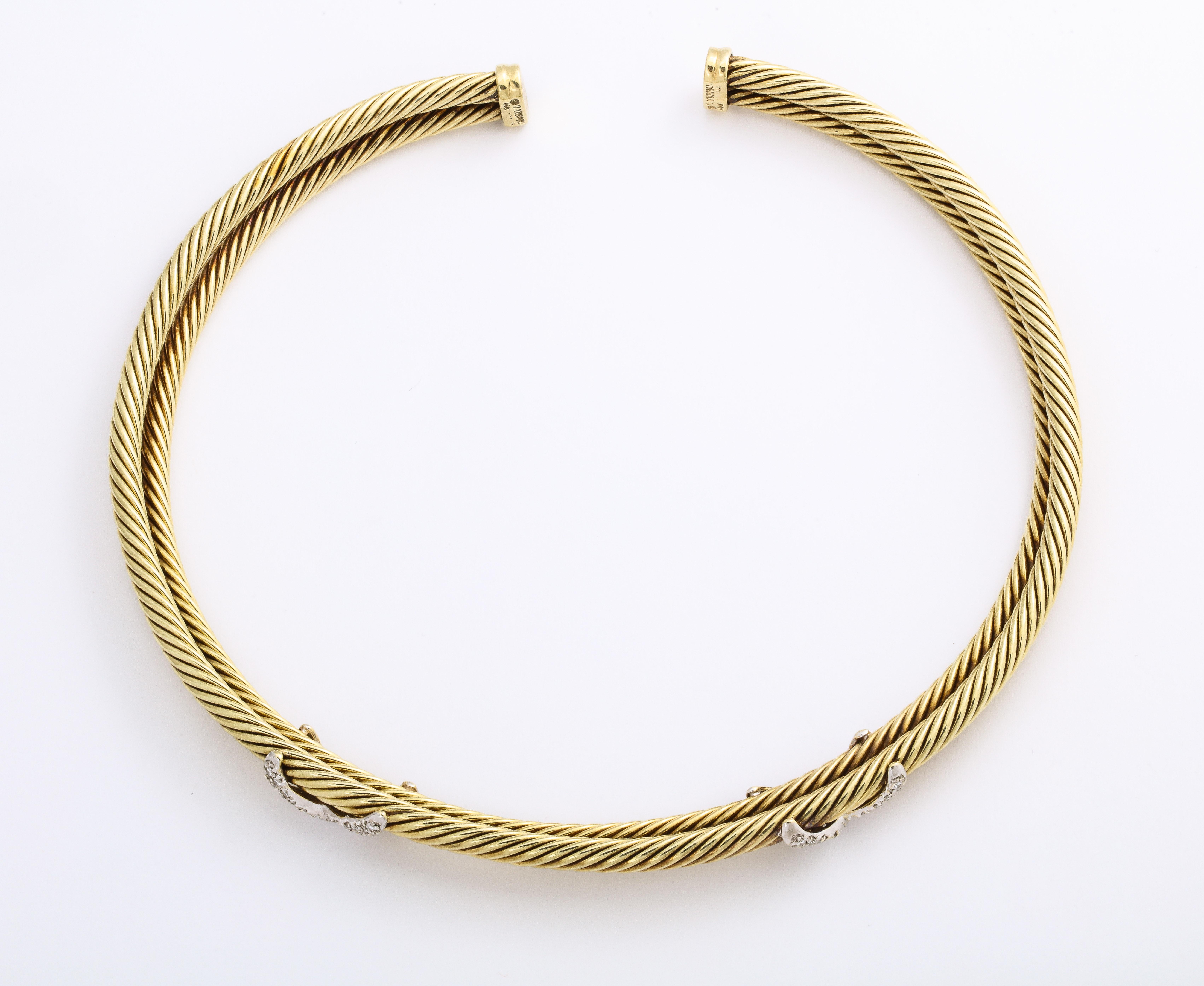 This Rigid Collar necklace by David Yurman features white full cut diamonds set in 14k Yellow Gold. It is expandable, and is stamped © D Yurman 14k at both ends.

Materials:
14k YG 27.7 dwt

Stones:
White full cut diamonds @ 2.25 ct