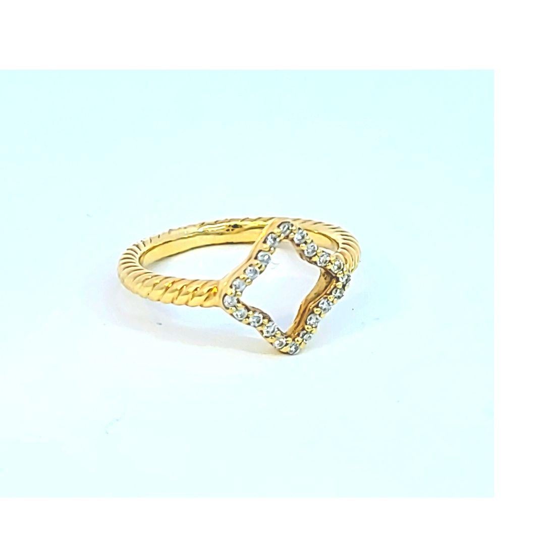 In 18 karat yellow gold with diamonds, this lovely ring is by David Yurman, from the Cable Collection!