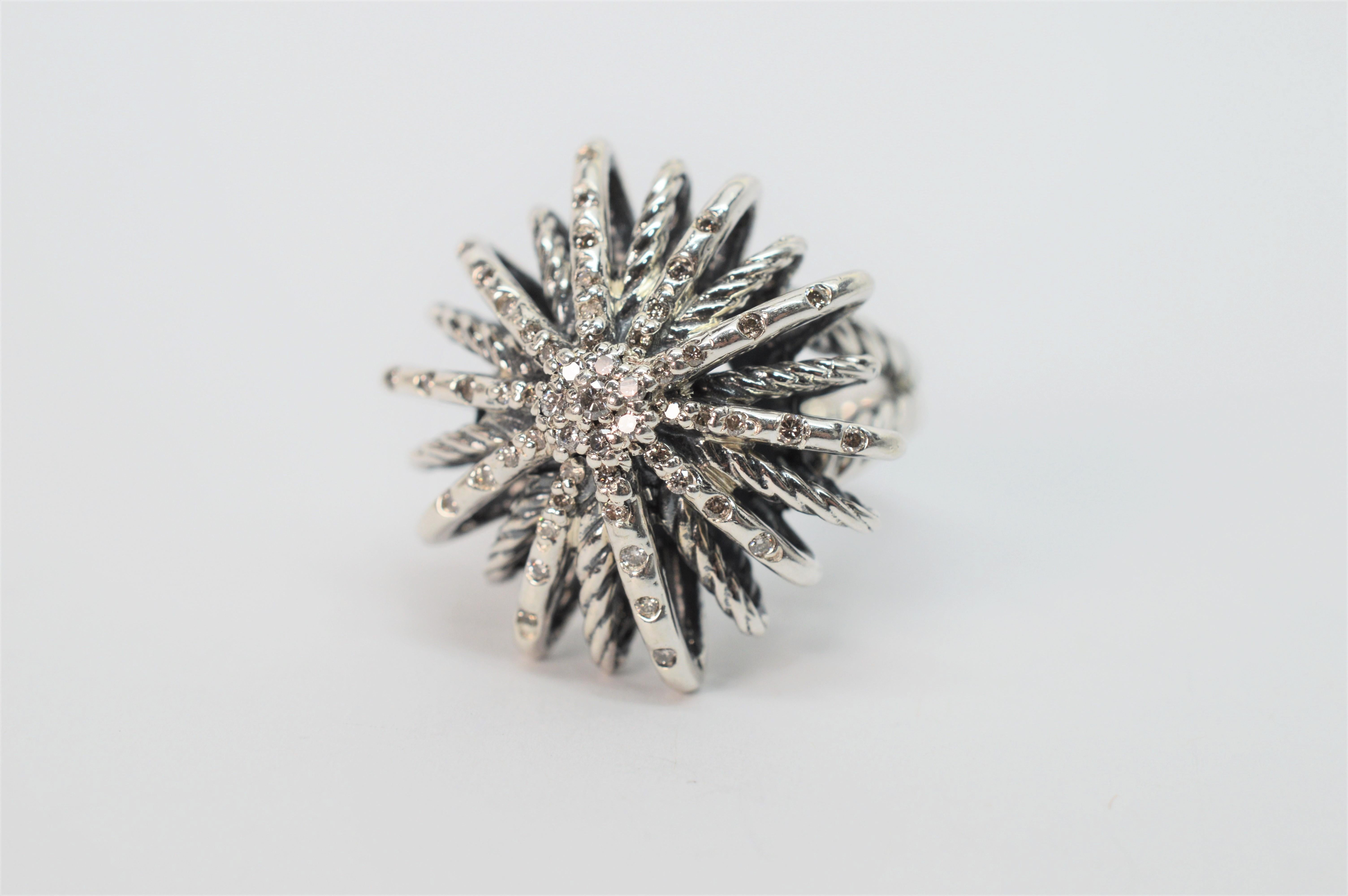 This flirty sterling cocktail ring from David Yurman's iconic Starburst Collection is said to be inspired by the designer's experience viewing fireworks in the Paris night sky.  The silver sprays are accented with an estimated .50 carats of diamonds