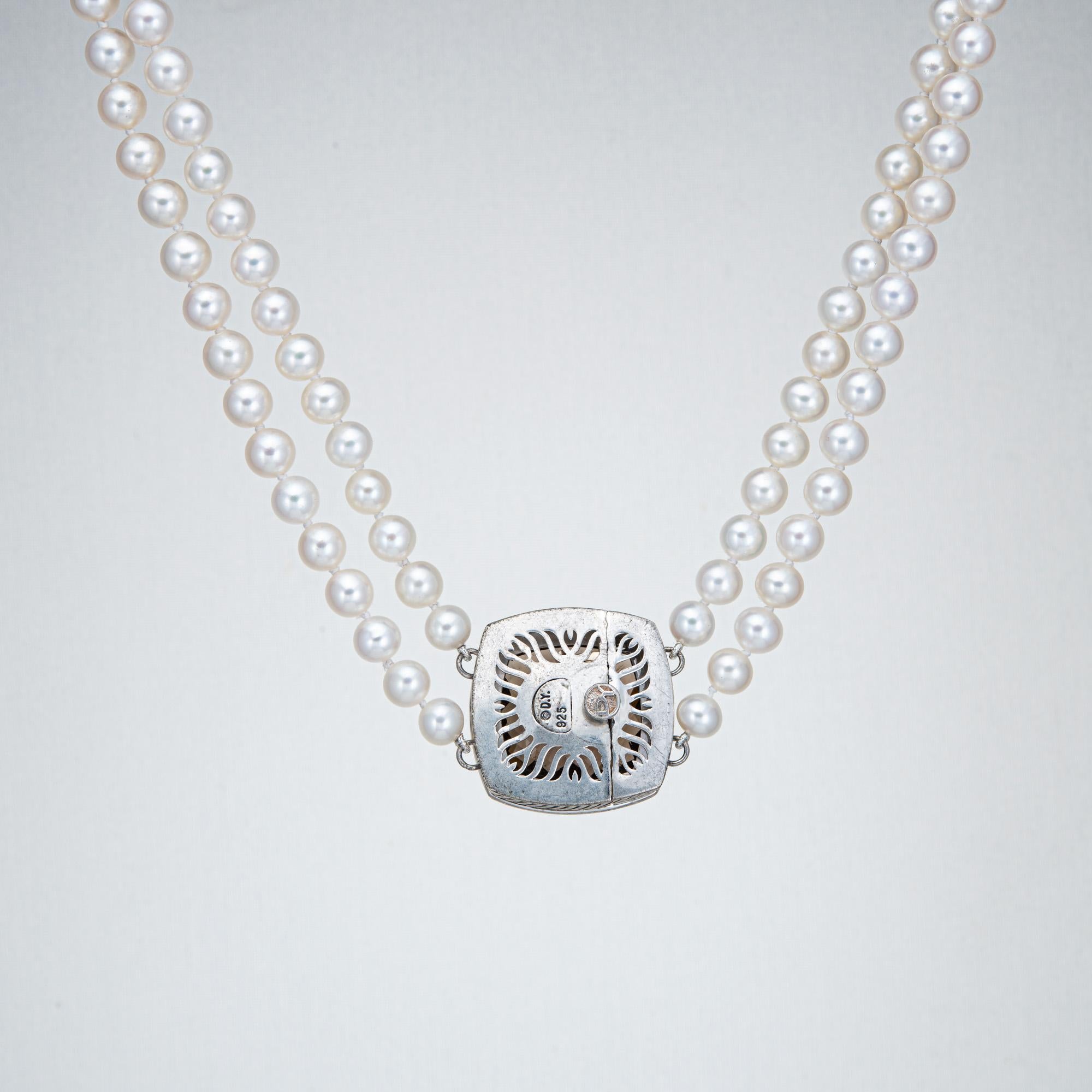 Finely detailed estate David Yurman double strand pearl necklace with a sterling silver diamond & smoky quartz set clasp.  

Checkerboard faceted smoky quartz measures 20mm. 50 diamonds total an estimated 0.40 carats (estimated at H-I color and
