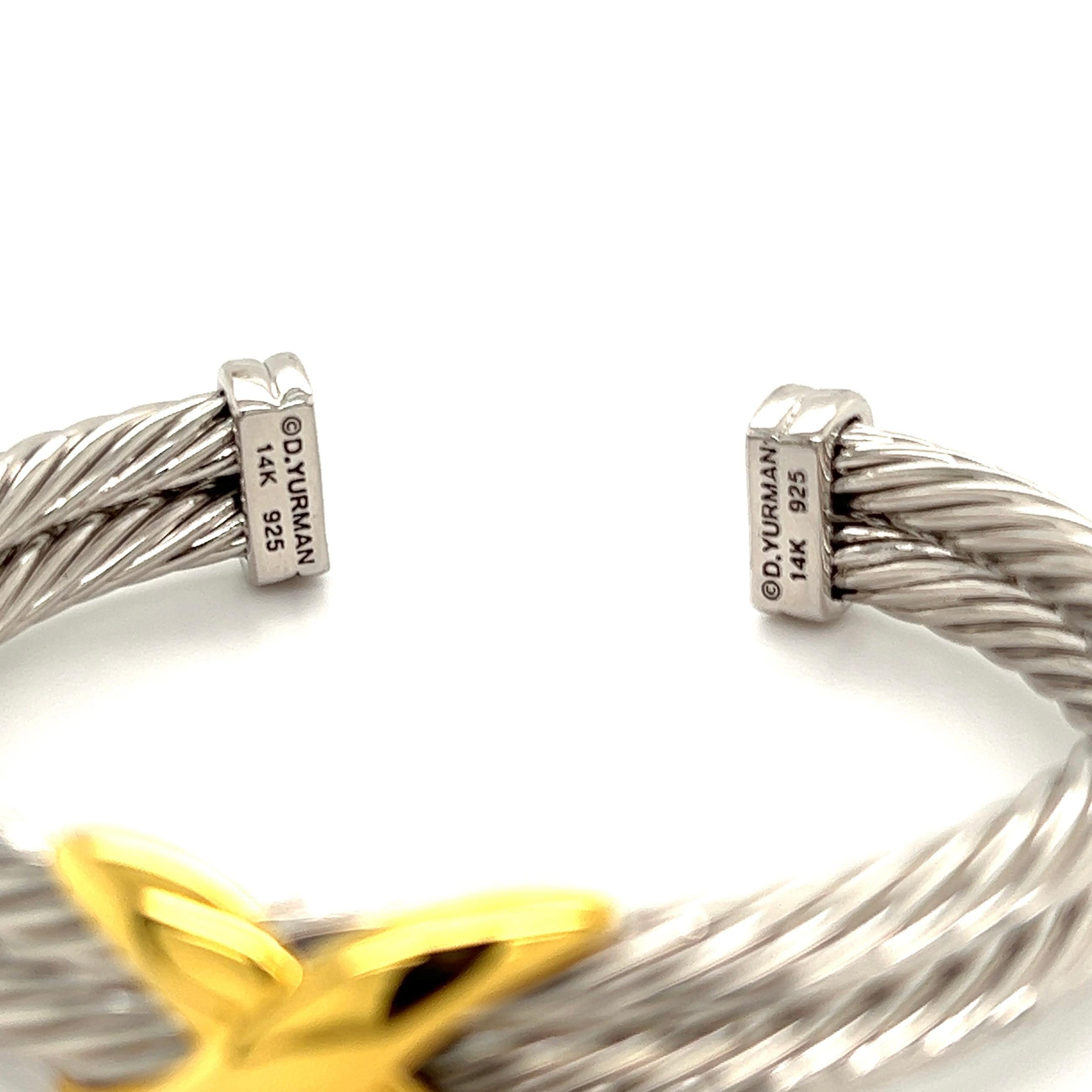 silver bracelet with gold x
