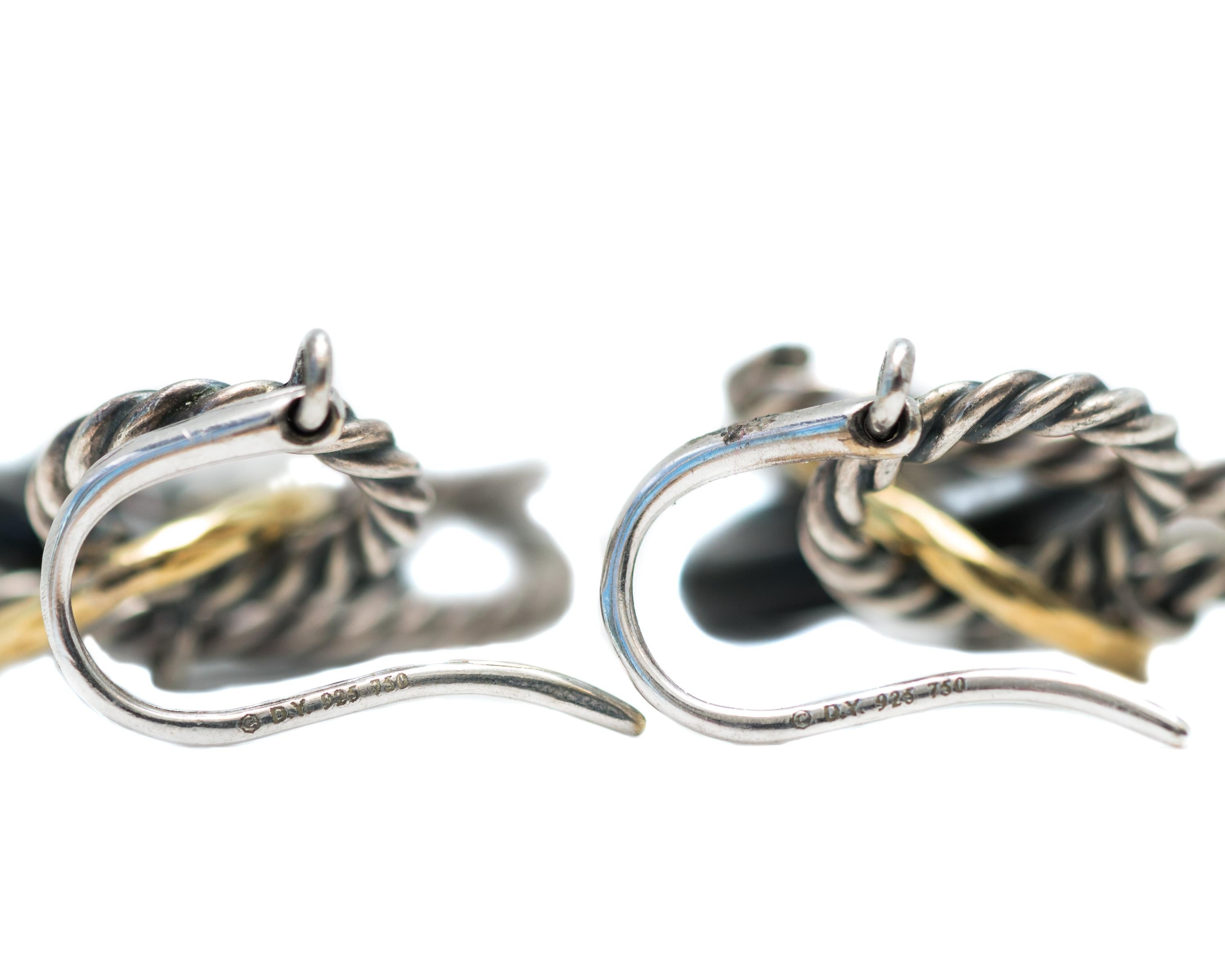 David Yurman Link Earrings - Sterling Silver, 18 Karat Yellow Gold, Onyx

Feature:
Sterling Silver Cable Links
18 Karat Yellow Gold Textured Links
Onyx Smooth Links
Sterling Silver Earring Hooks

Earrings measure 2 1/4 inches long
Widest link is 3/4
