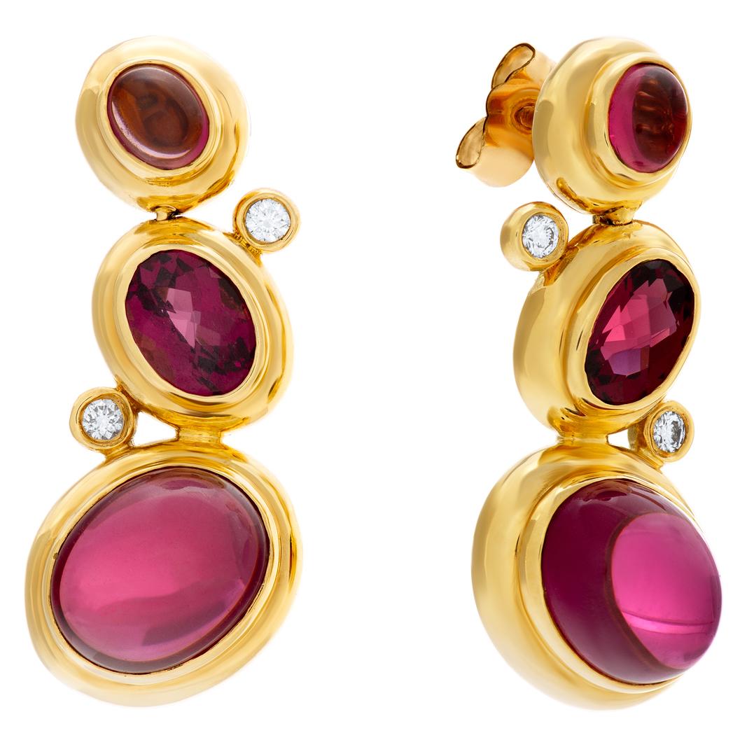 ESTIMATED RETAIL: $2,950   YOUR PRICE: $1,950.00

David Yurman earrings in 18k with cabochon and faceted garnet and diamonds accents. 

Drop length: 29.5mm. Width: 12mm.