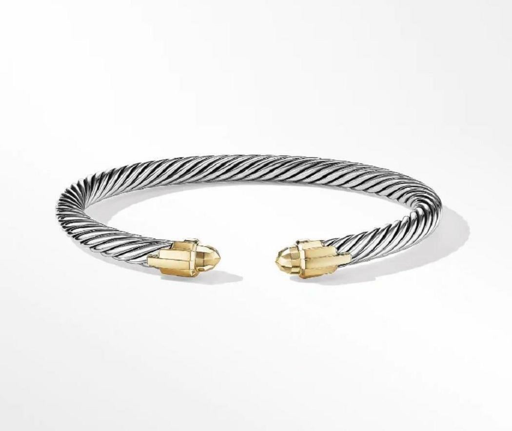 Sterling Silver with 18-karat Yellow Gold
Gold Domes
Bracelet, 5mm
Medium size
Comes with David Yurman pouch
Retail: $1350