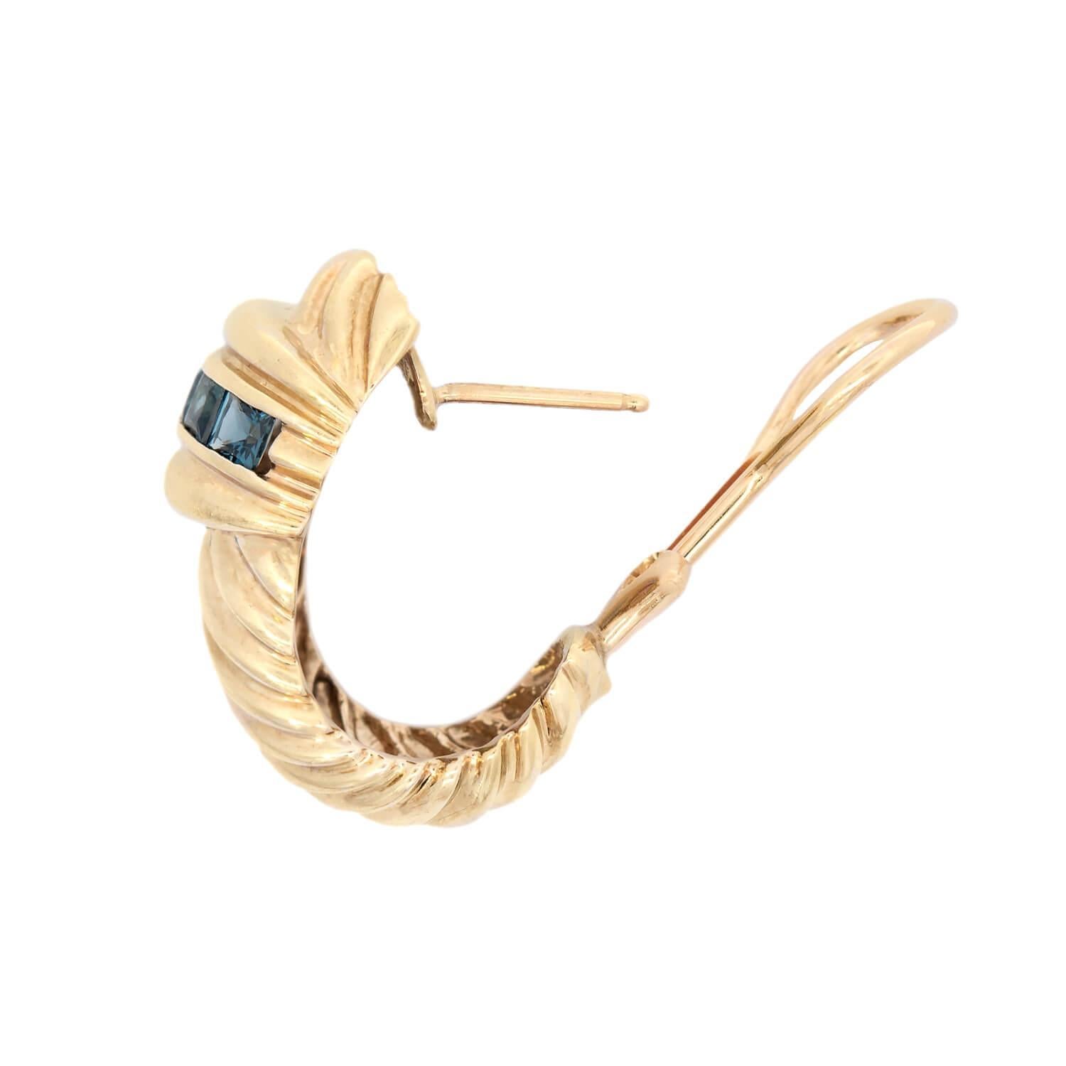 A striking pair of Estate earrings from renowned jewelry designer David Yurman! These fabulous earrings are crafted in 14k yellow gold, and have a rounded, domed design. A row of 5 French cut sapphires create a horizontal row at the top of each