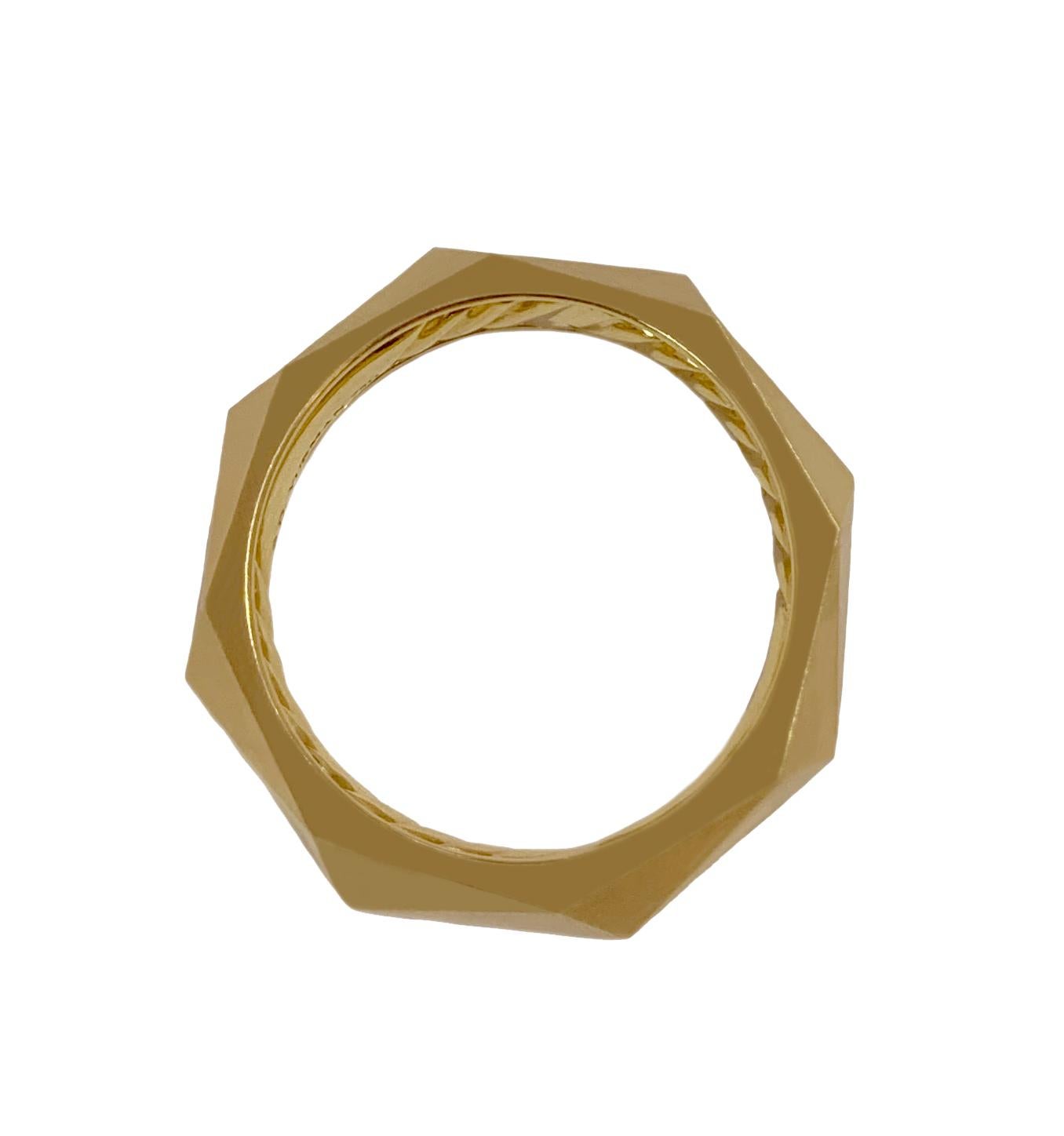torqued faceted band ring