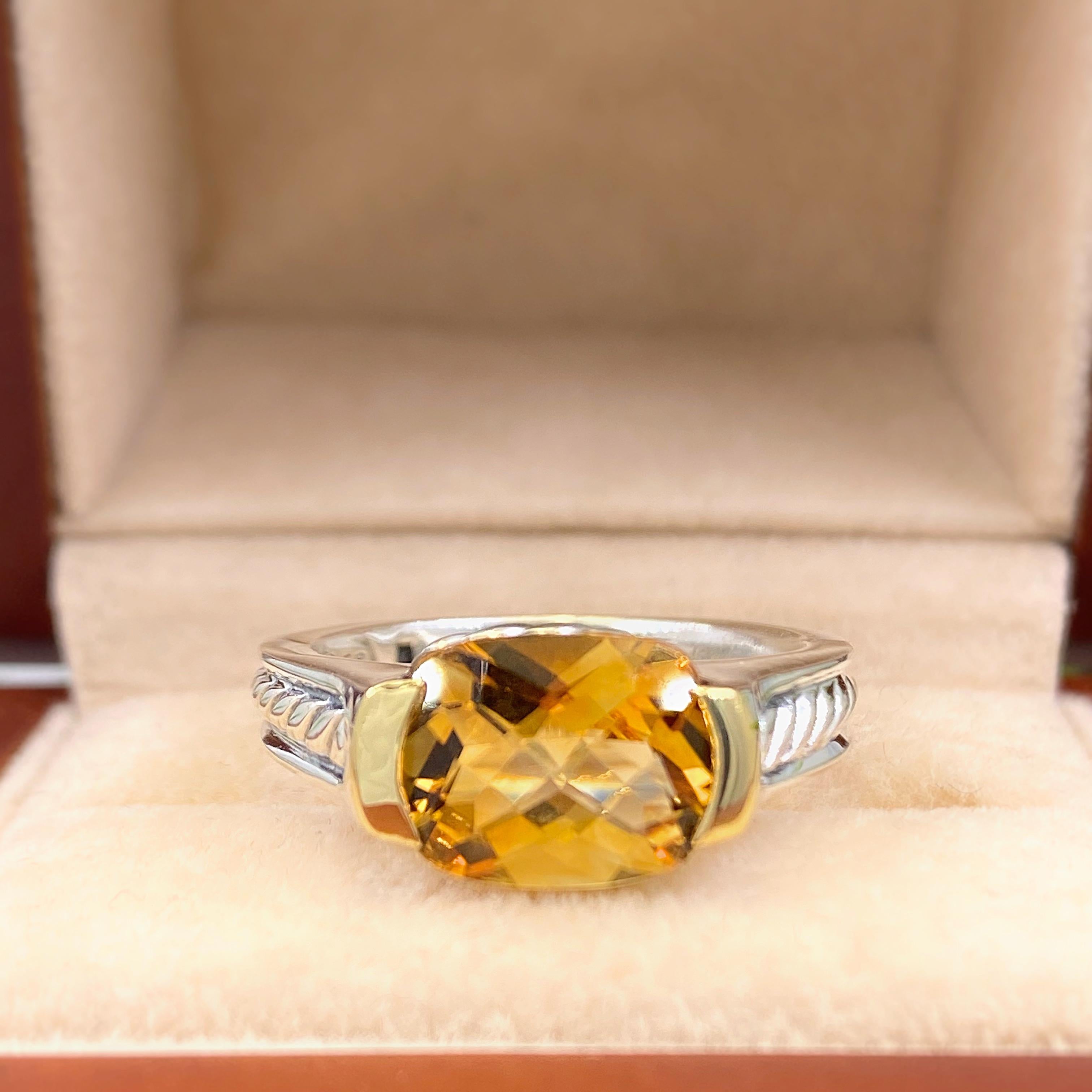 David Yurman Citrine Cable Ring
Metal:  Sterling Silver & 18kt Yellow Gold
Size:  7.25 sizable
Gemstone:  8 MM
Hallmark:  ©D.Y.825 750
Includes:  Elegant Ring Box
Retail:  $1,150

Sku#11980TCF011018