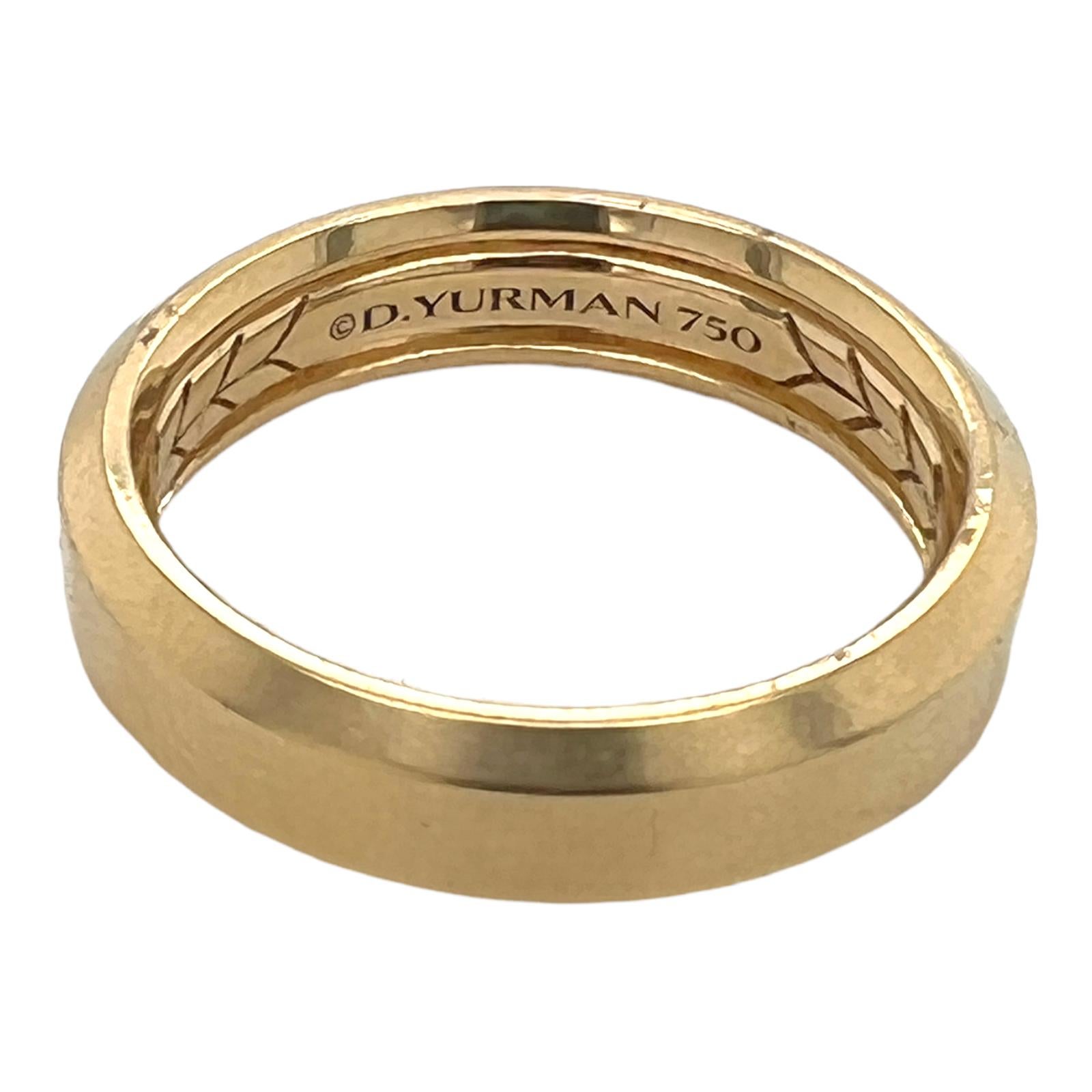David Yurman Gents Wedding Band ring fashioned in 18 karat yellow gold. The beveled design is modern and clean. The band measures 6mm in width and is size 10. Signed D. Yurman 750. 

MSRP: $2,100.00