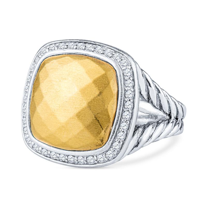 This ring from David Yurman is crafted from sterling silver and features an 18 karat yellow gold plated dome accented by 0.30 carat total weight in diamonds. The split shank features the classic cable twist. This ring is a size 8 but can be resized