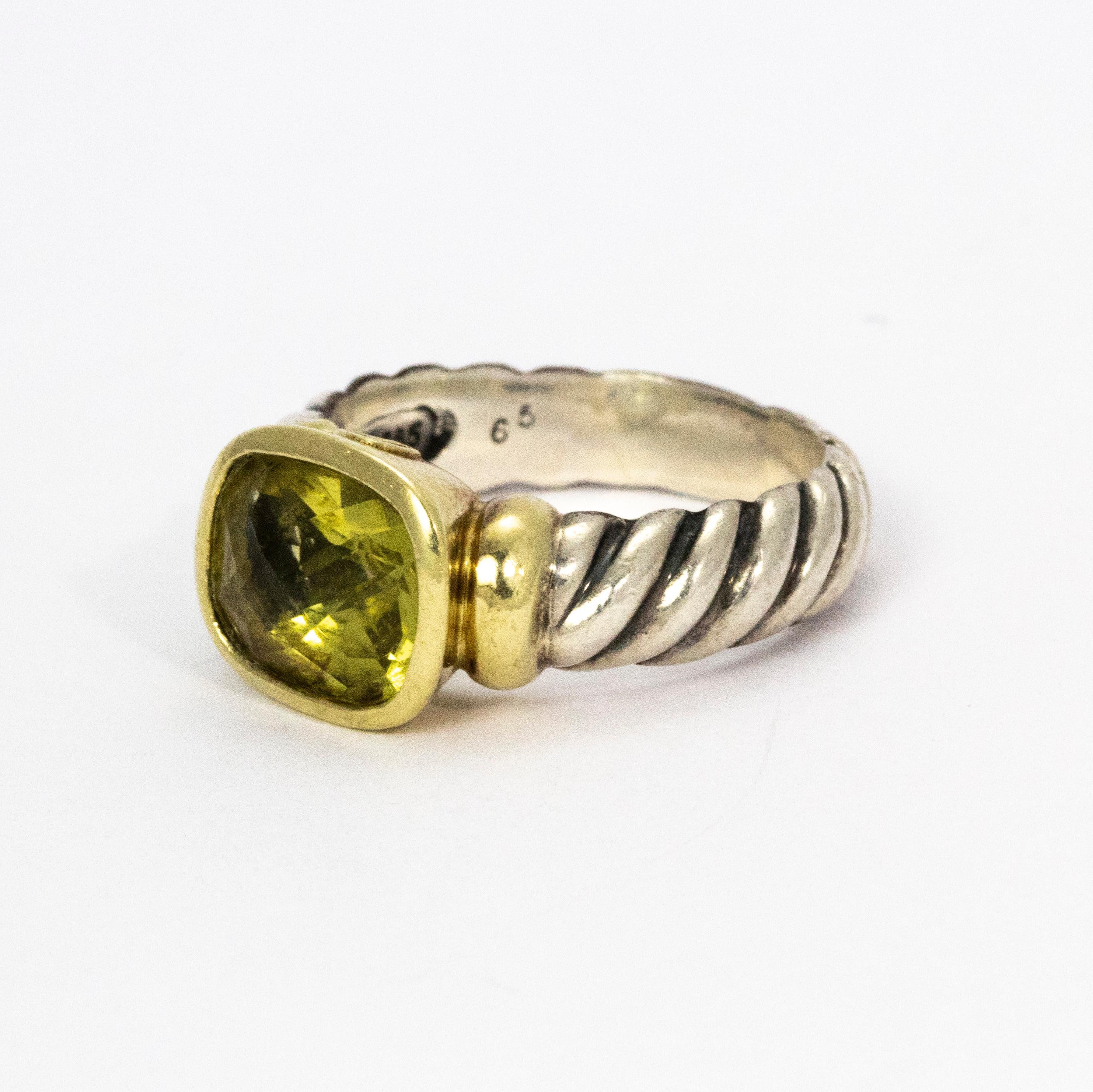 Beautiful David Yurman classic silver cable band with dazzling green Tourmaline stone in a 14k gold setting.

Ring Size: M or 7