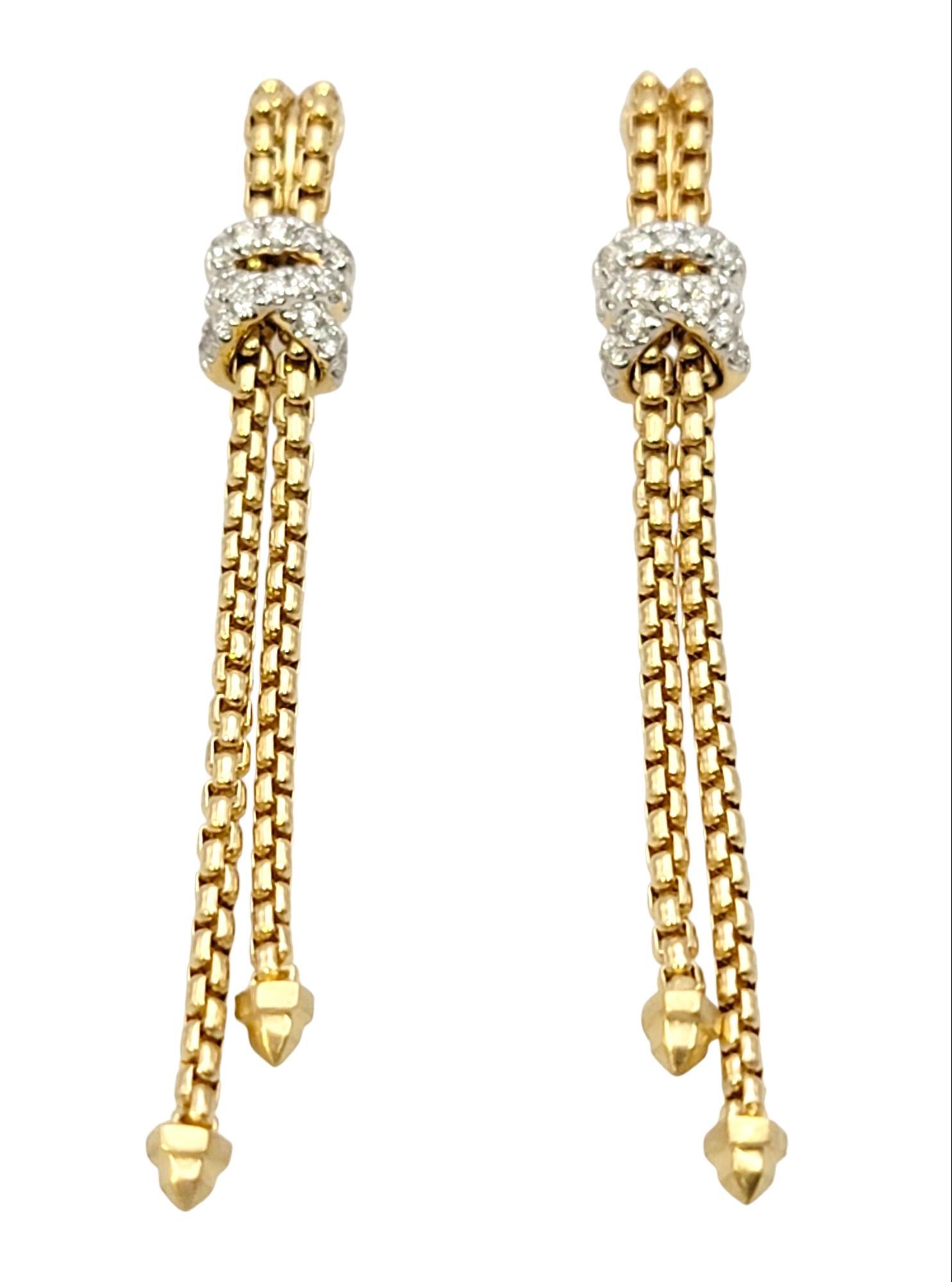 Lovely gold and diamond dangle earrings by popular jewelry designer, David Yurman. Founded in 1980 by artists David and Sybil Yurman, the company is, in their own words, “one long art project.” Their ability to fuse fashion, art and jewelry into
