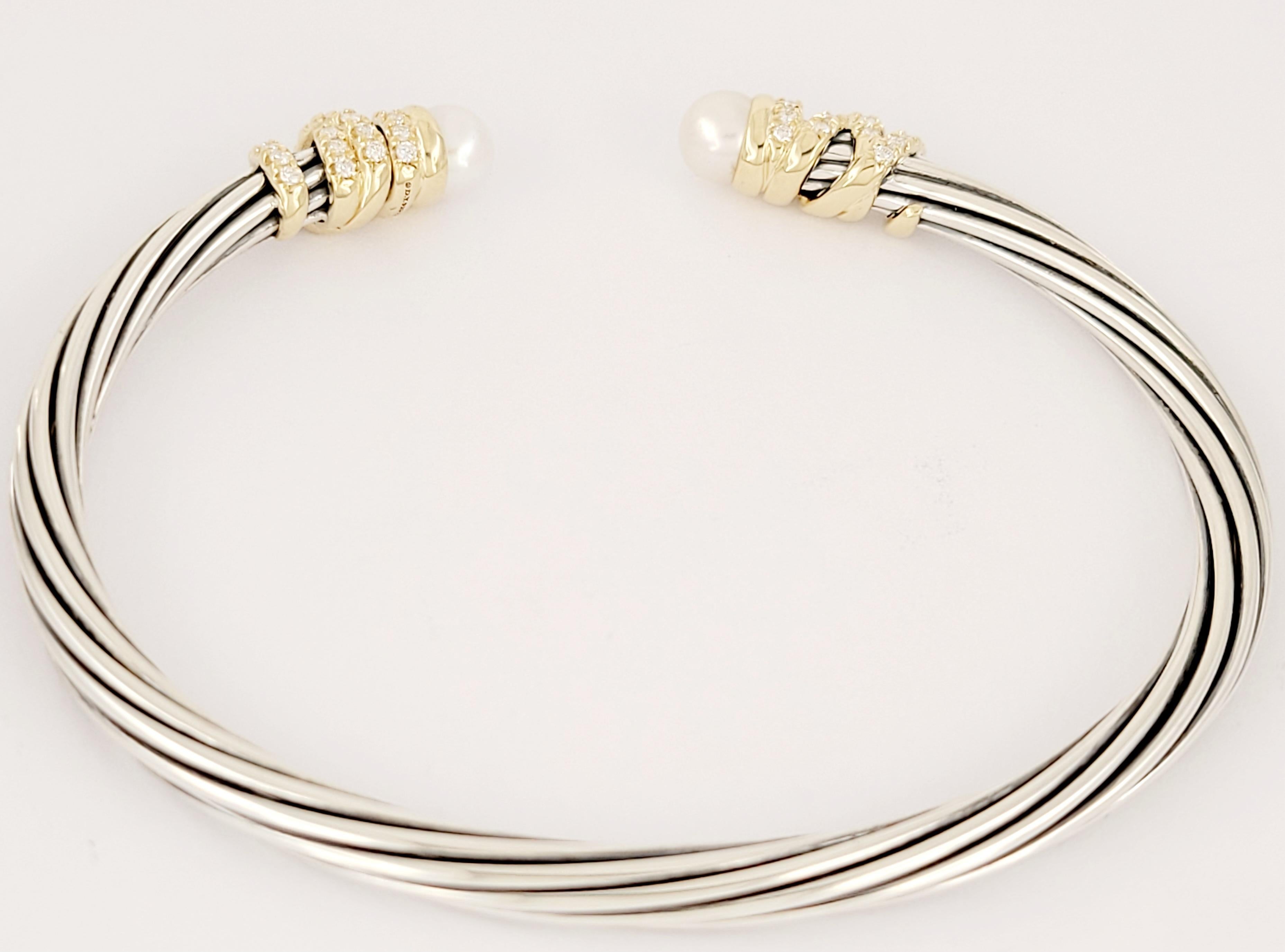 Brand David Yurman
Sterling Silver with 18K Yellow Gold 
Perl -Cultured freshwater pearls, 5-5.5mm
Gold-Dome -18K gold domes
Pave diamonds, 0.45 total weight
Bracelet comes with David Yurman Bracelet Box