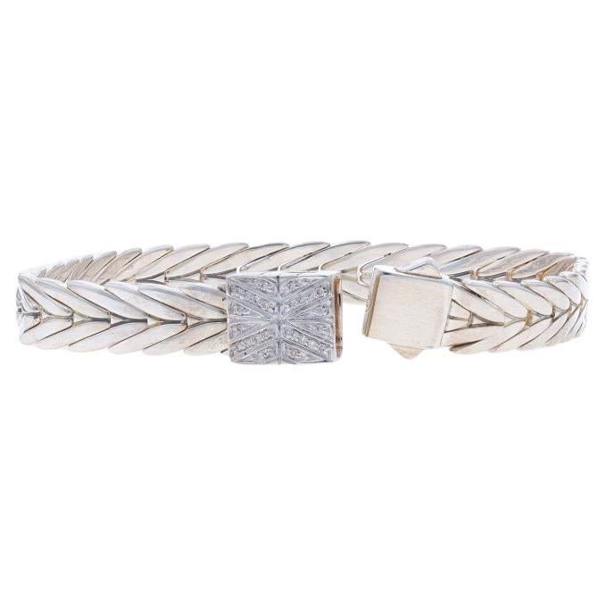 Retail Price: $495

Brand: David Yurman
Collection: Infinity

Metal Content: Sterling Silver

Stone Information

Natural Diamonds
Carat(s): .05ctw
Cut: Round Brilliant

Style: Bangle
Fastening Type: Hook Clasp
Theme: Love
Features: Cable