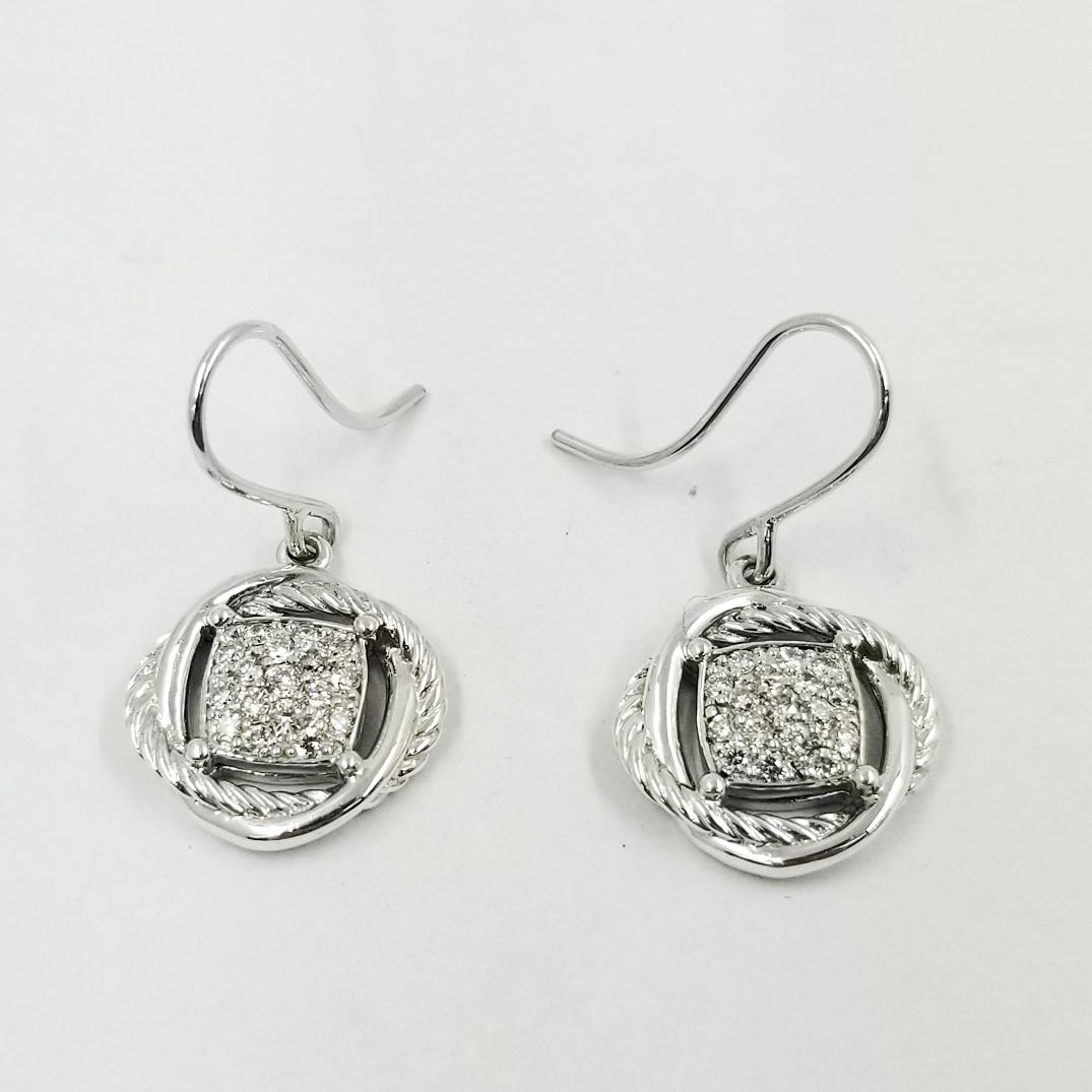 David Yurman Sterling Silver Drop Earrings Featuring 0.31cttw Round Diamonds. $1200 MSRP from the Infinity Collection. Professionally polished and cleaned. Includes David Yurman pouch. Shepherd's Hook Attachment.