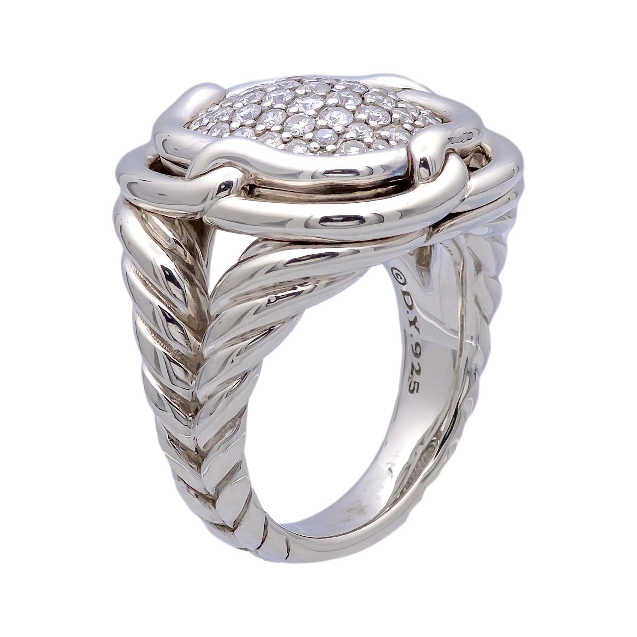 David Yurman ring from the Labyrinth collection finely crafted in sterling silver featuring round brilliant cut pave set diamonds in the center weighing 1.00 carats total weight approximately. Ring has double twisted wire shank with interlocking