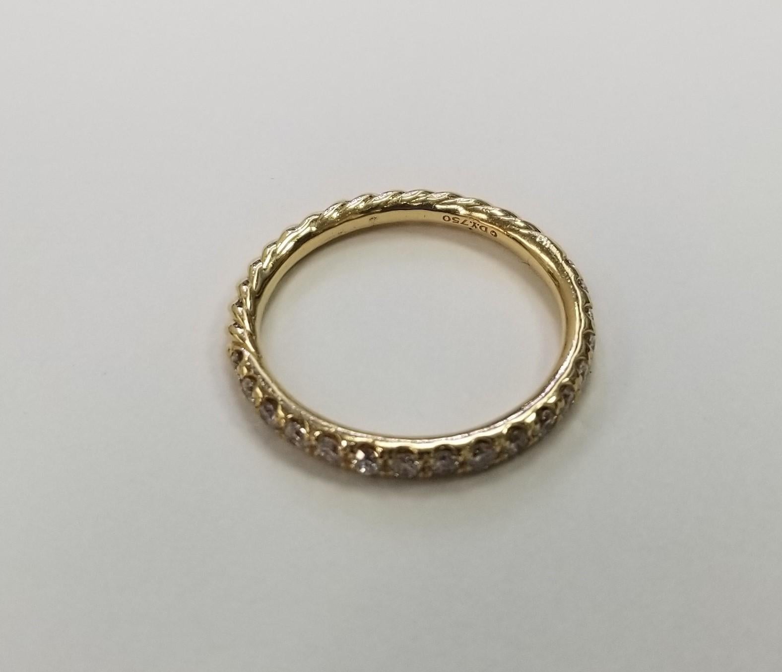 Lady's DAVID YURMAN made polished 18K yellow gold, diamond contemporary-style wedding band with a half-round shank. Engraved with 