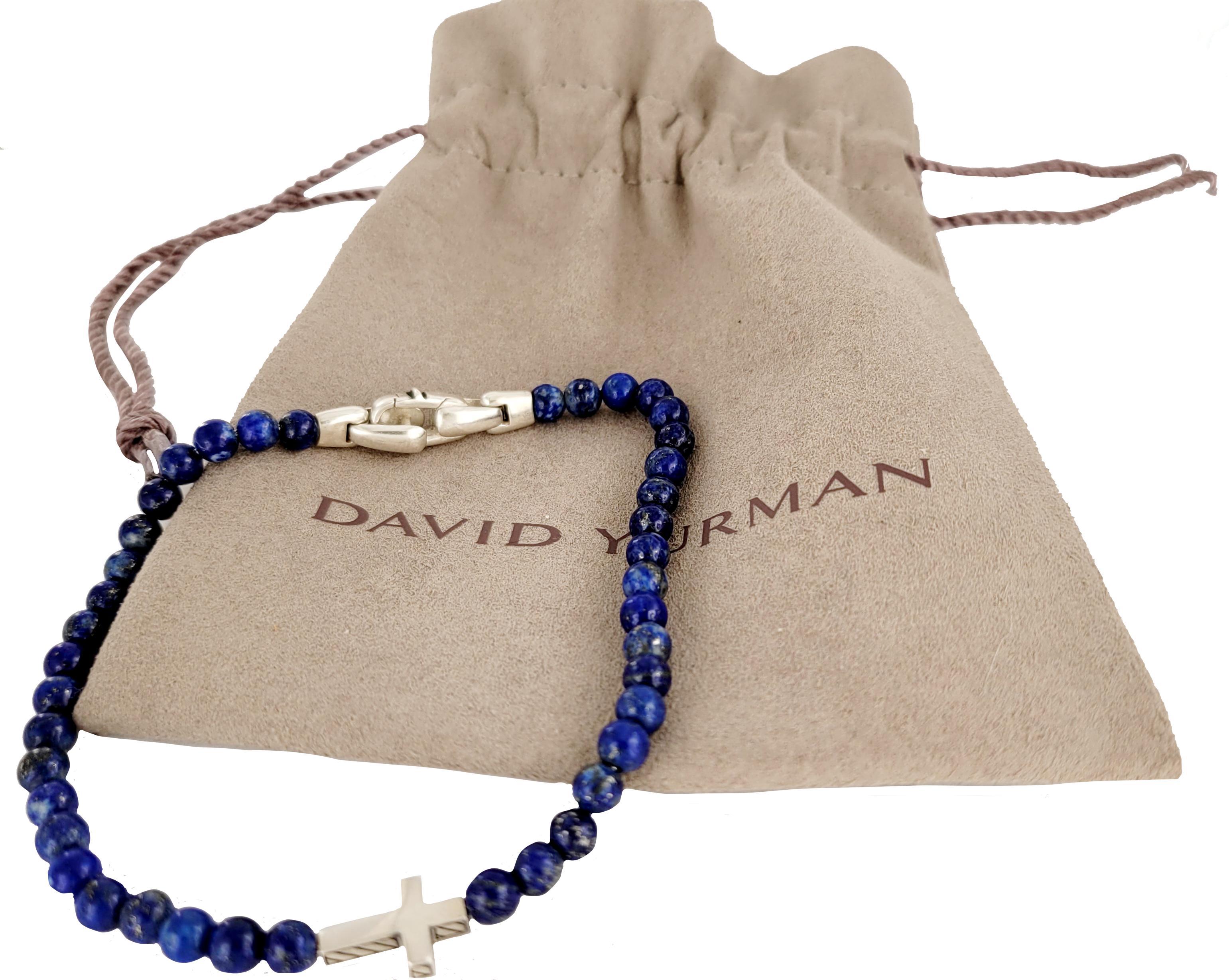 Marchio David Yurman
Argento 925   
Bracciale lungo 8,5''
Perline da 4,5 mm
La croce misura 11,7 X 8,3 mm
Spessore trasversale 2,7 mm
Genere Uomini
Condizione Nuova
Viene fornito con l'astuccio David Yurman. 