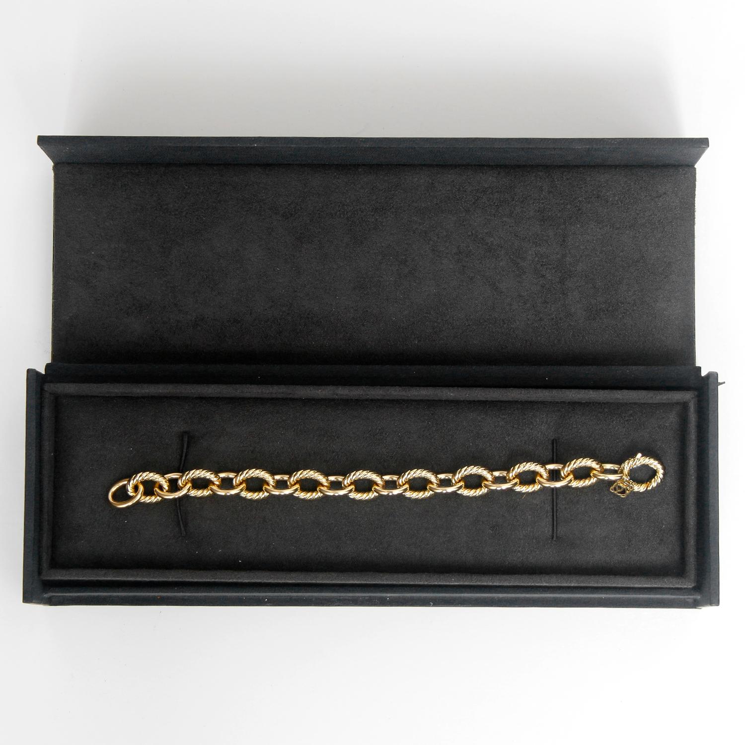 David Yurman Large Oval Link Bracelet - 18K Yellow gold  oval link bracelet. Alternating between a solid link and David Yurman's signature rope link. 12 mm wide with a lobster clasp. Total weight 31.2 grams .