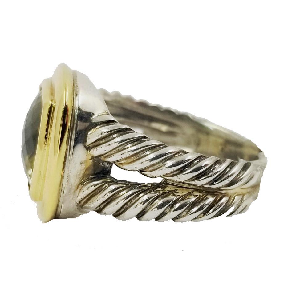 18 Karat Yellow Gold & Sterling Silver Albion Ring from David Yurman. Bezel-set cushion-cut Lemon Citrine Quartz centerstone in a two tone twisted split shank design. Finger size 8; can be sized prior to shipment. 