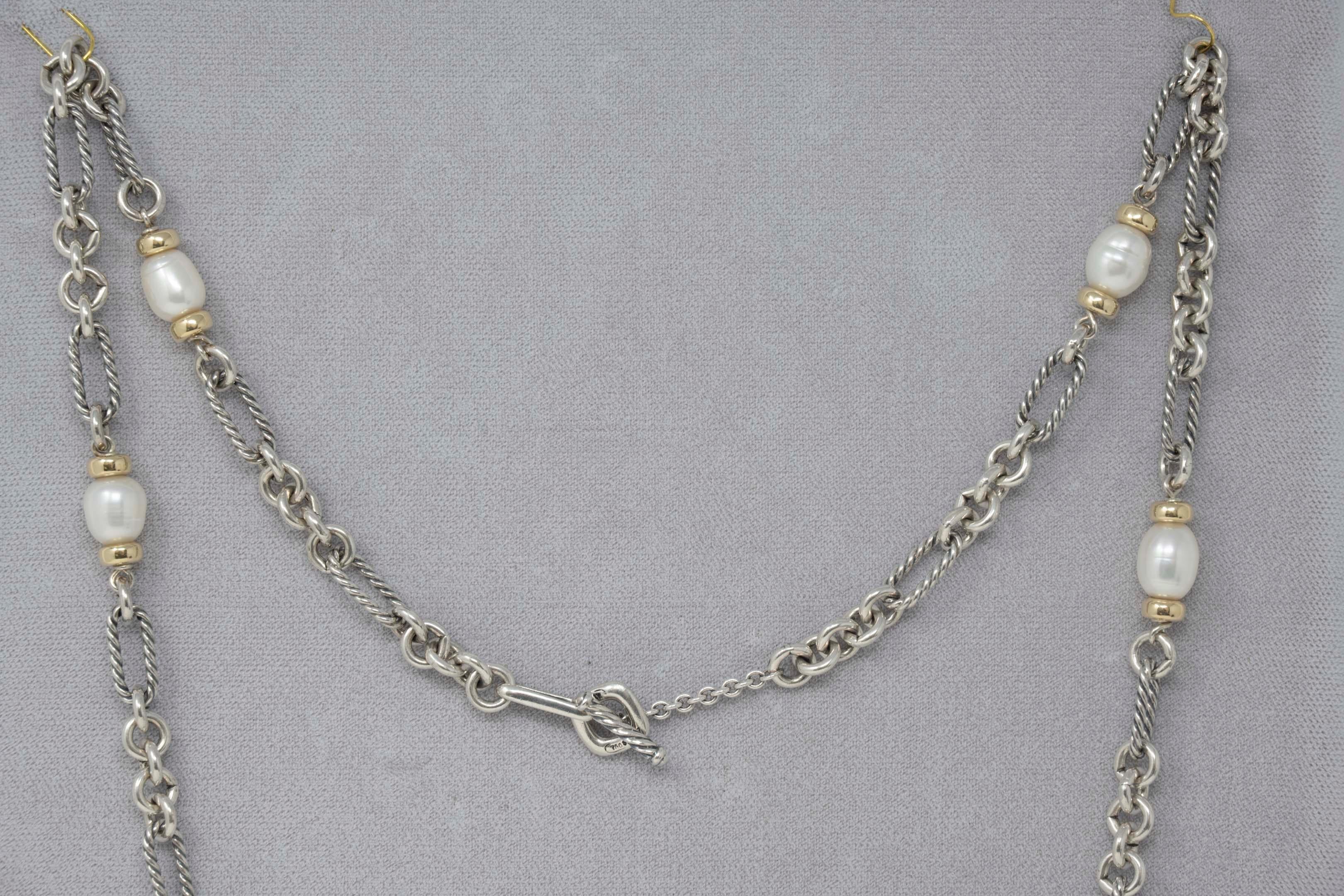 David Yurman link pearls necklace, stamped D.Y. 750, 925. 33.5 inches long with 7 pearls and a toggle closure, 81.6 grams. In good condition, period 2010.
