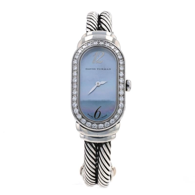 Brand: David Yurman
Model: Madison
Model Number: T408-MSS
Dial Color: Blue
Metal Content: Sterling Silver & Stainless Steel
Movement: Quartz
Warranty: One-Year

Stone Information: 
Genuine Mother of Pearl
Color: Blue

Natural Diamonds 
Total Carats: