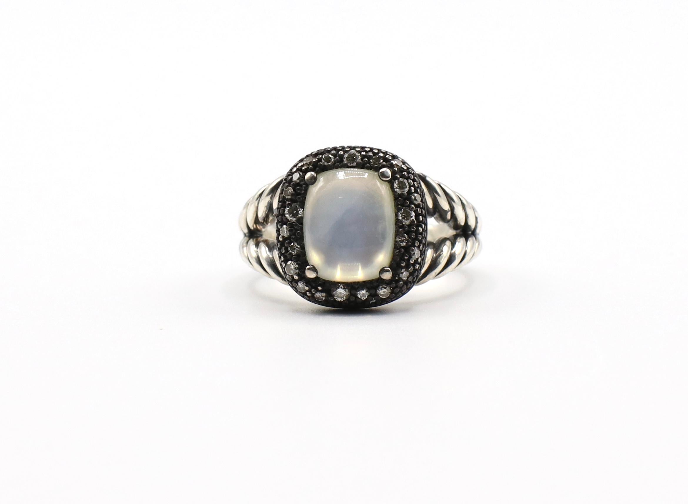 David Yurman Metallic Midnight Mélange Moonstone Sterling Silver Diamond 0.20 CTW Cable Ring Size 7.75

Metal: Sterling Silver 925
Weight: 8.25 grams
Pave diamonds measure approx. 0.20 ctw G-H VS
Ring measures approx. 15mm x 13mm at widest and
