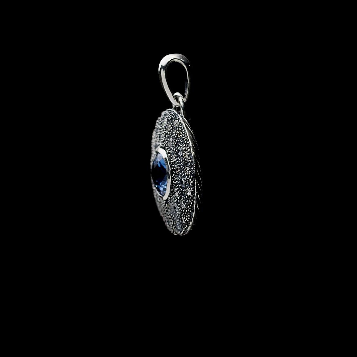 Item Details:
Estimated Retail - $1,800.00
Brand - David Yurman
Collection - Midnight Melange
Metal - 925 Sterling Silver
Total Carat Weight (TCW) - 0.75 ctw (diamonds only)
Style - Pendant
Pendant L x W - 39.5 X 27.3 mm
Colored Stone Color -