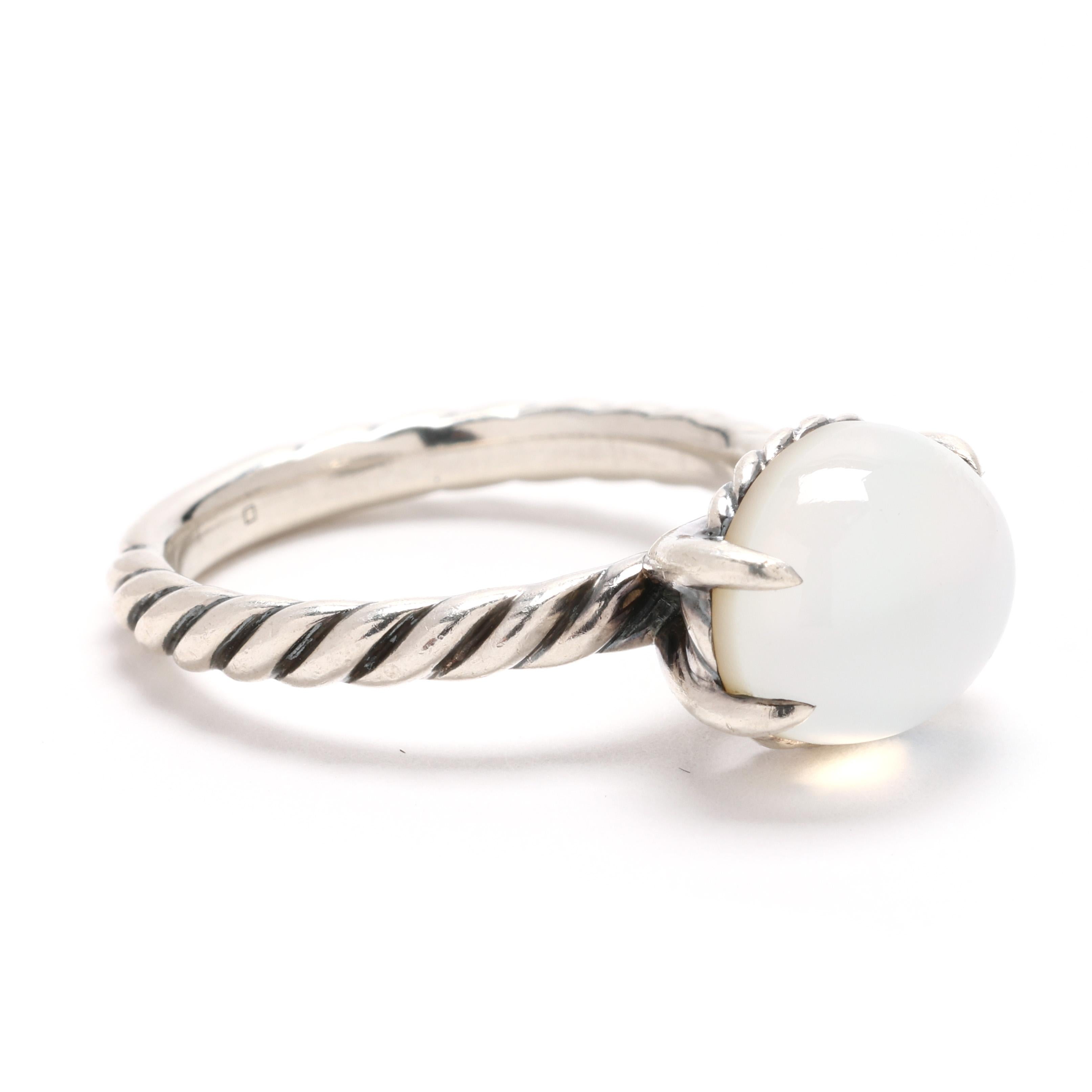 Elevate your style with this captivating David Yurman moonstone ring, crafted in sterling silver. This size 8.25 ring features a mesmerizing moonstone, known for its ethereal glow, set in David Yurman’s iconic cable design. Perfect for lovers of