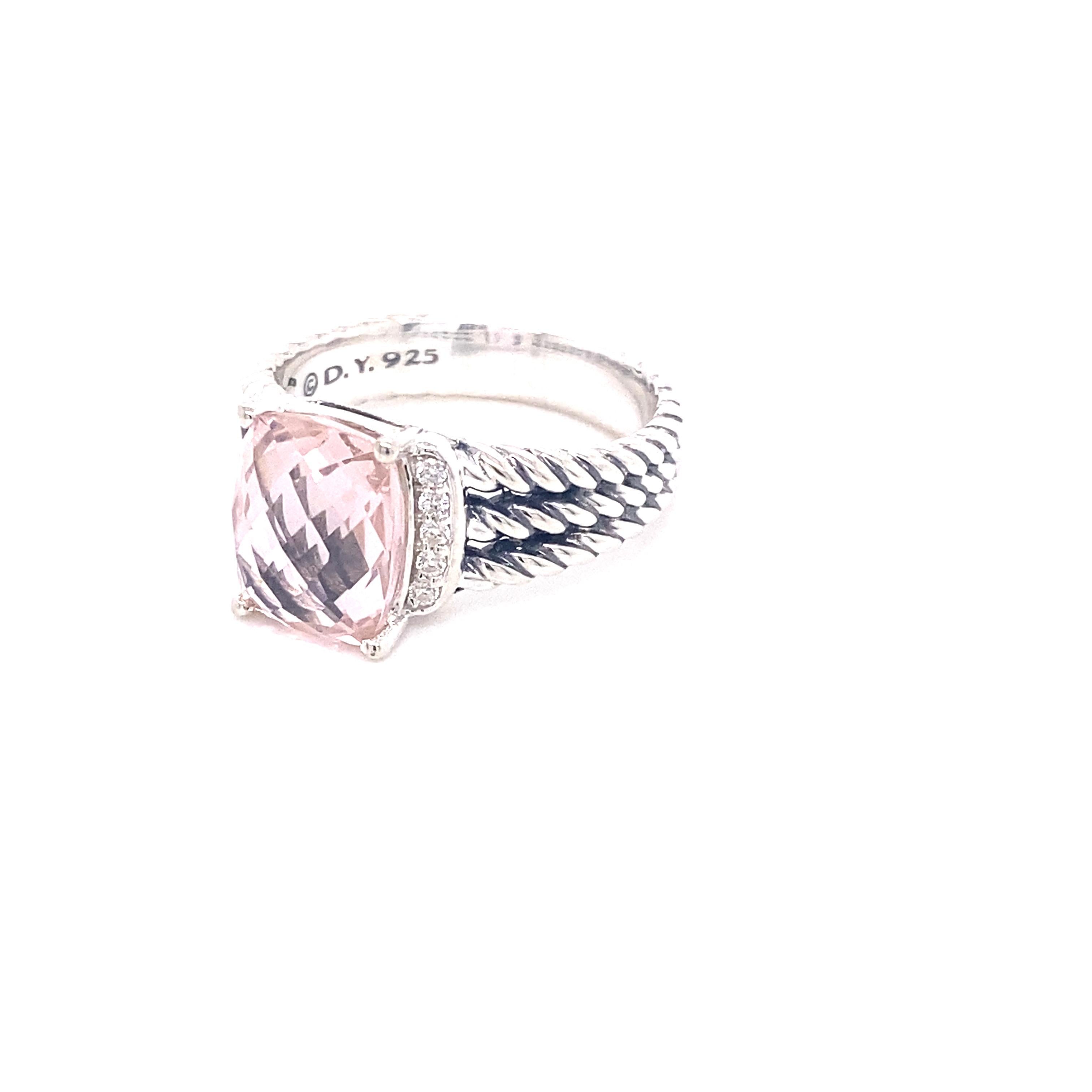 This classic David Yurman ring features a faceted morganite stone at the center accentuated with .08ctw pave diamonds set on a triple cable band crafted in sterling silver.  It is currently a size 7.5 but can be resized upon request. 
Morganite: 10