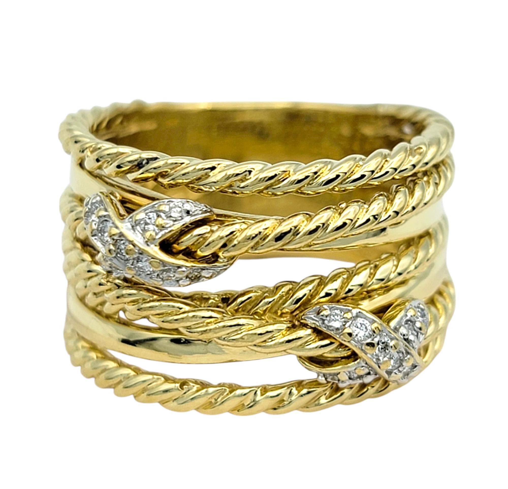 Ring Size: 6.75 

This David Yurman multi-row band ring in 18 karat yellow gold is a striking blend of classic elegance and contemporary design. Featuring Yurman's iconic cable motif, the ring’s wide, multi-row structure adds depth and texture,