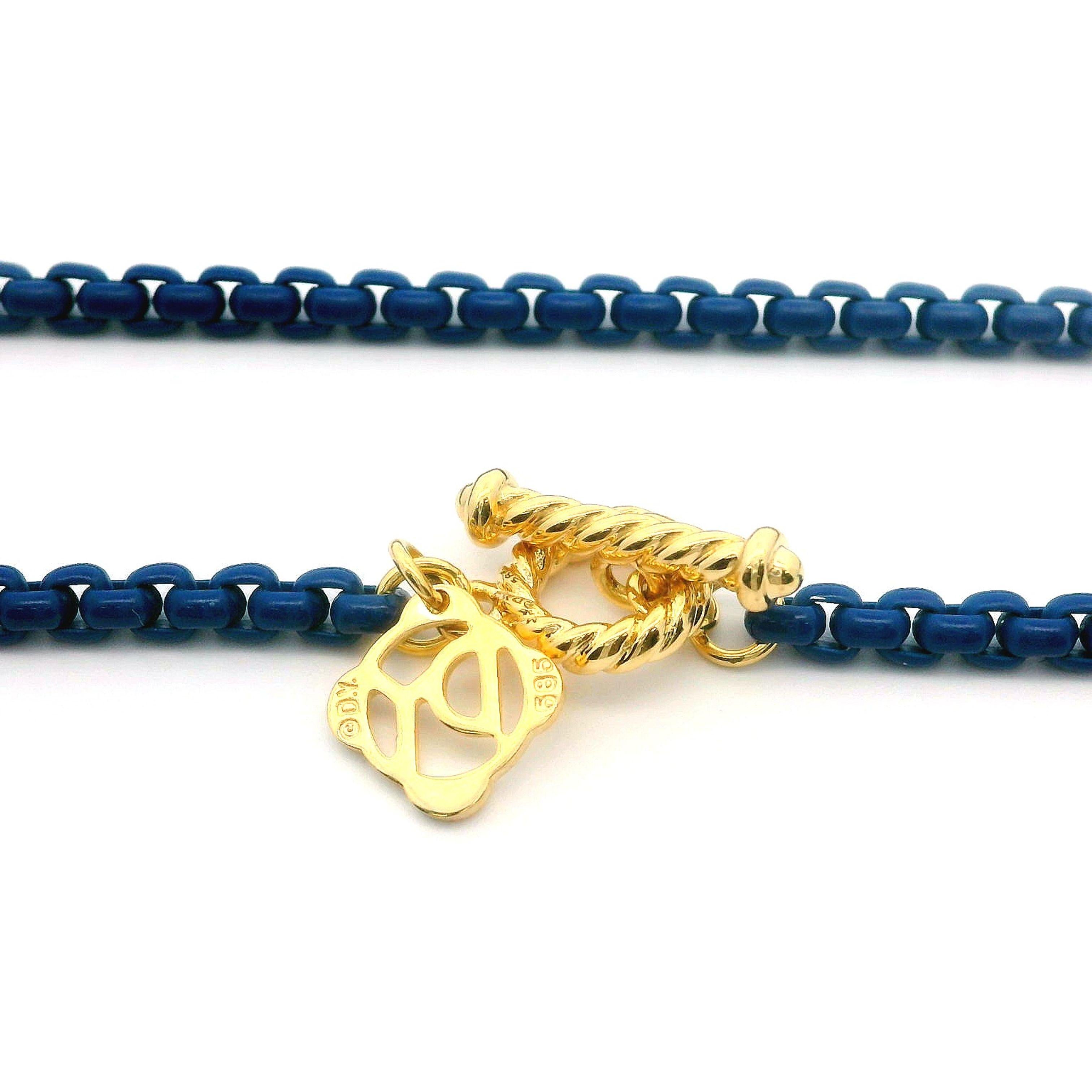 Material: Navy Blue Acrylic & 14K Solid Yellow Gold Clasps
Weight: 25.75 Grams (total)
Chain Type: Box Link
Chain Length: 14 Inches & 27 Inches (Measured next to a ruler), 41 Inches (together)
Chain Width: 2.7mm
Clasp: Toggle Clasp
Stamp:
